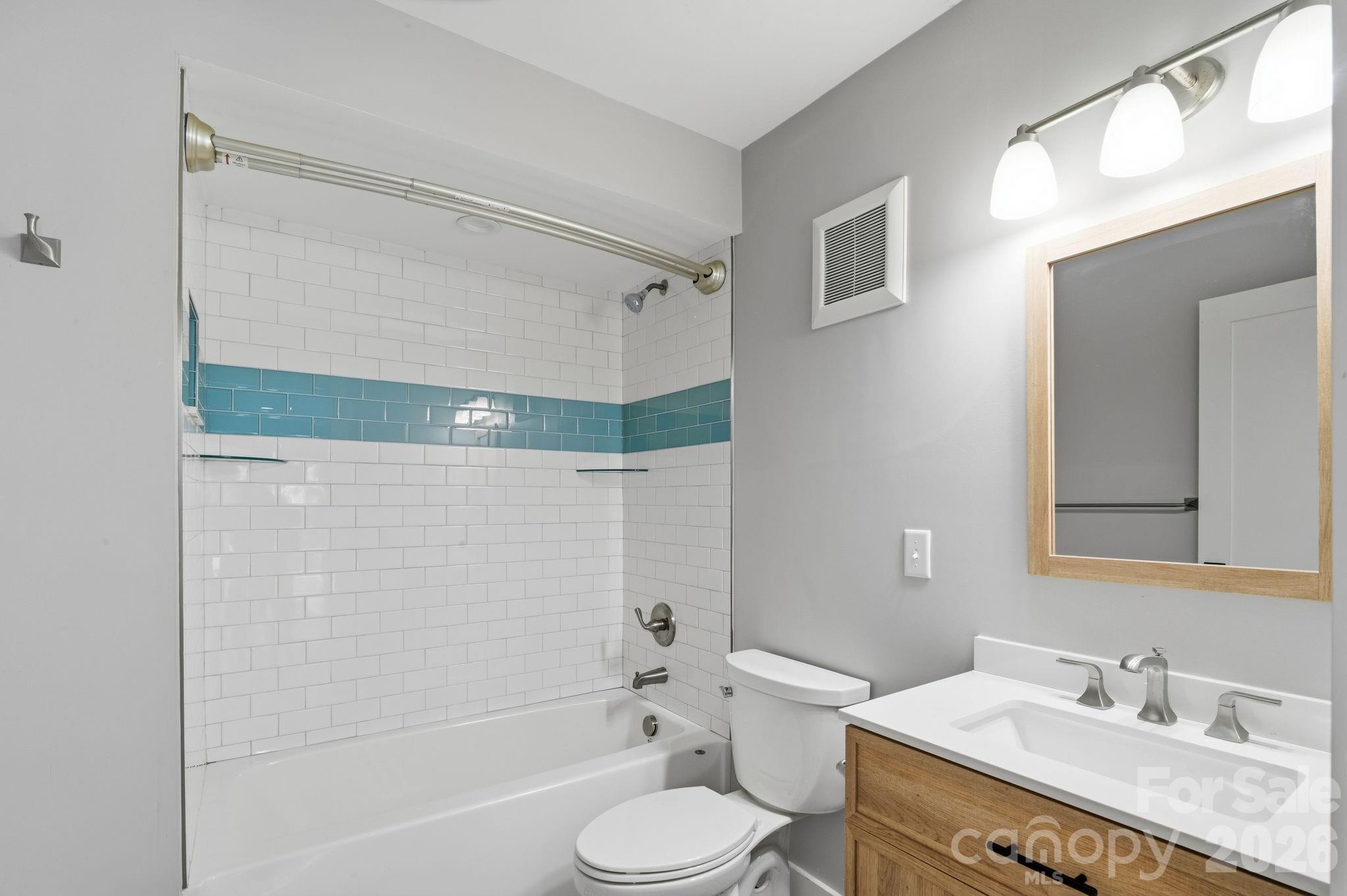 2nd bathroom with tub and shower - 77 Trotter Place, Asheville