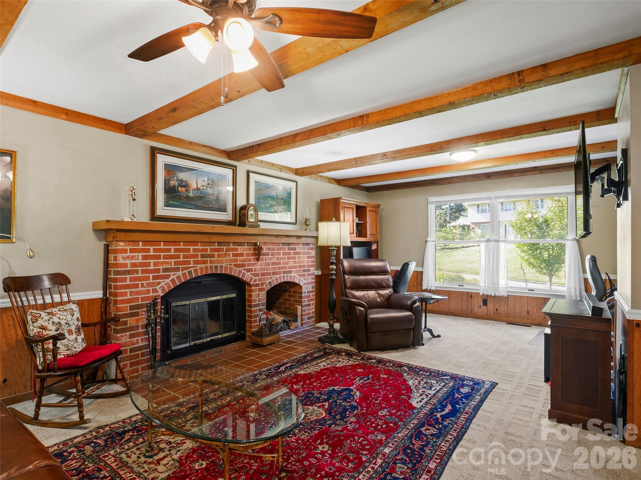 Cozy living room with accent beams - 101 Castlerock Drive, Asheville