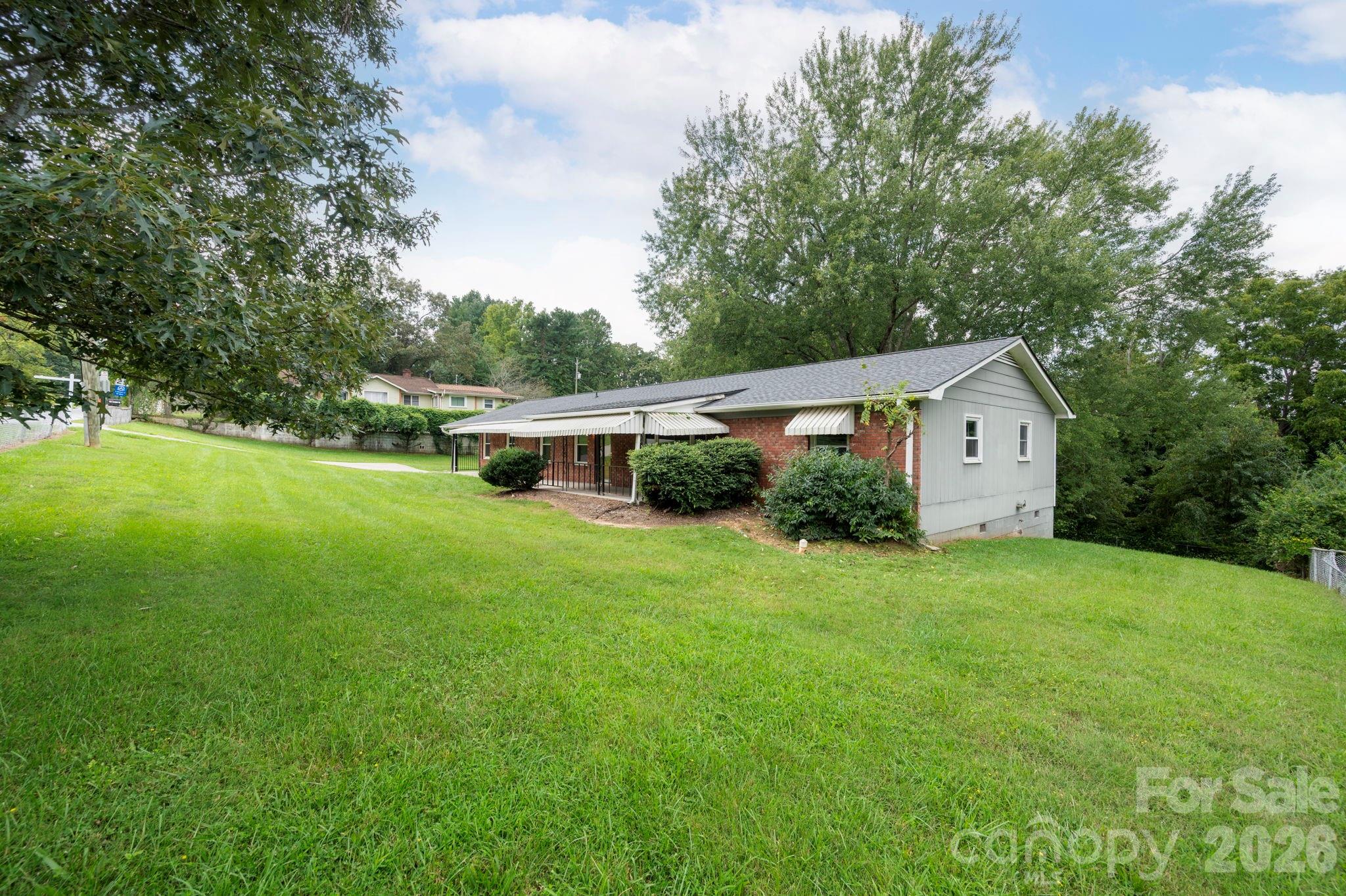 Facing house - right side - 483 Caribou Road, Asheville