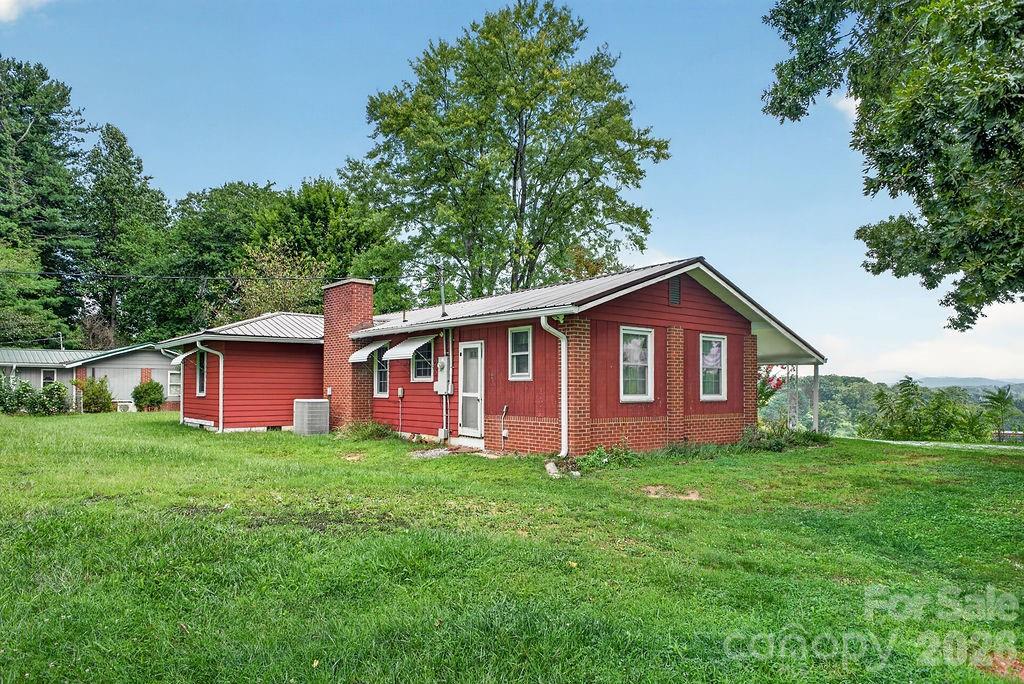 Rear view of the cottage with long range mountain views - 2409 Lucas Street, Hendersonville