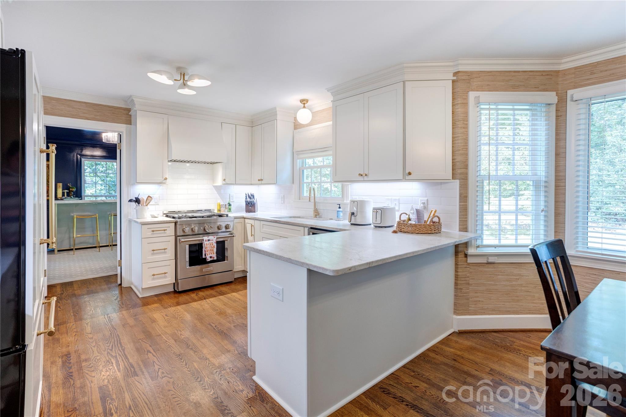 The peninsula offers the perfect spot for chatting up the chef. - 215 Bethel Drive, Salisbury
