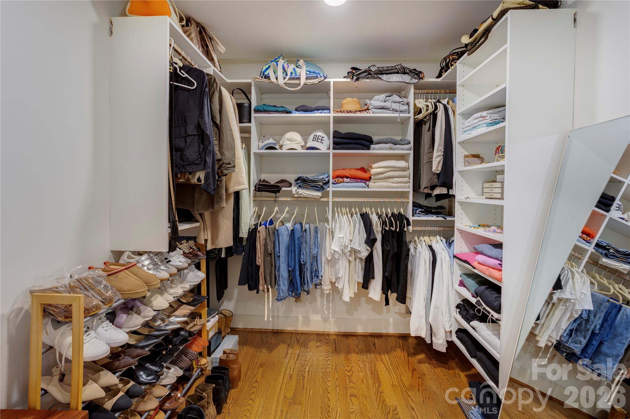 A custom walk in closet, designed and built by Closet Maker Man. - 215 Bethel Drive, Salisbury