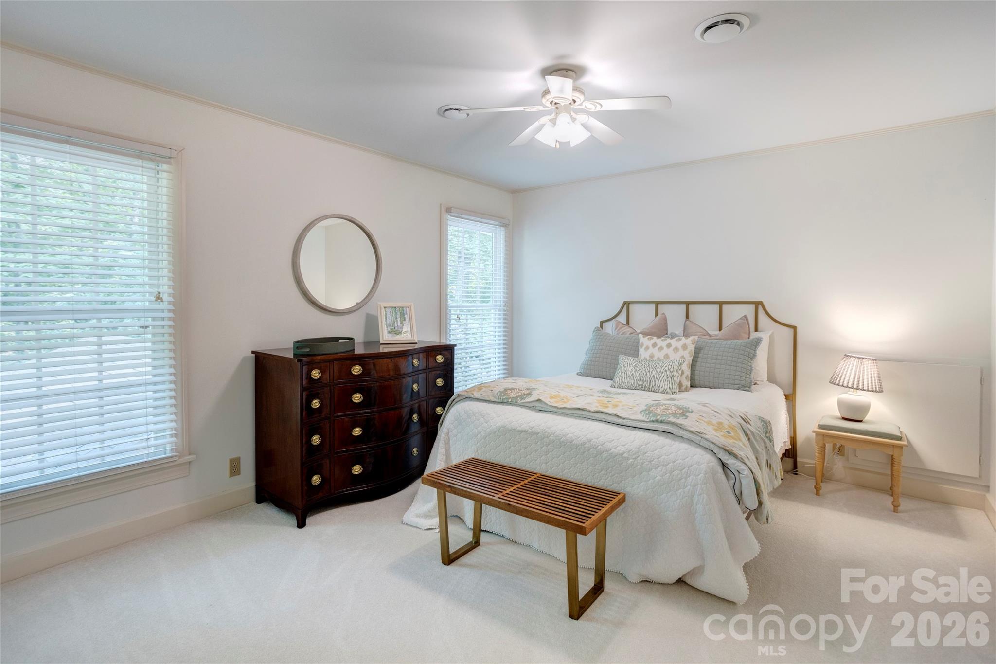 Another secondary bedroom offers a relaxing space for guests. - 215 Bethel Drive, Salisbury