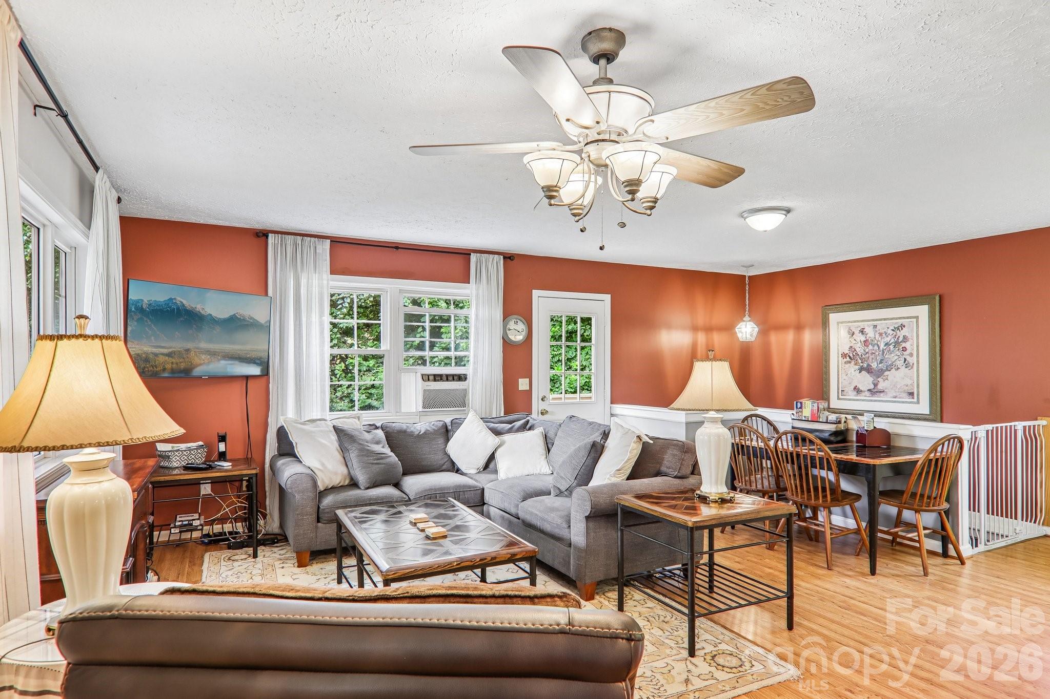 Living area with stairs to lower level - 169 Highview Drive, Maggie Valley