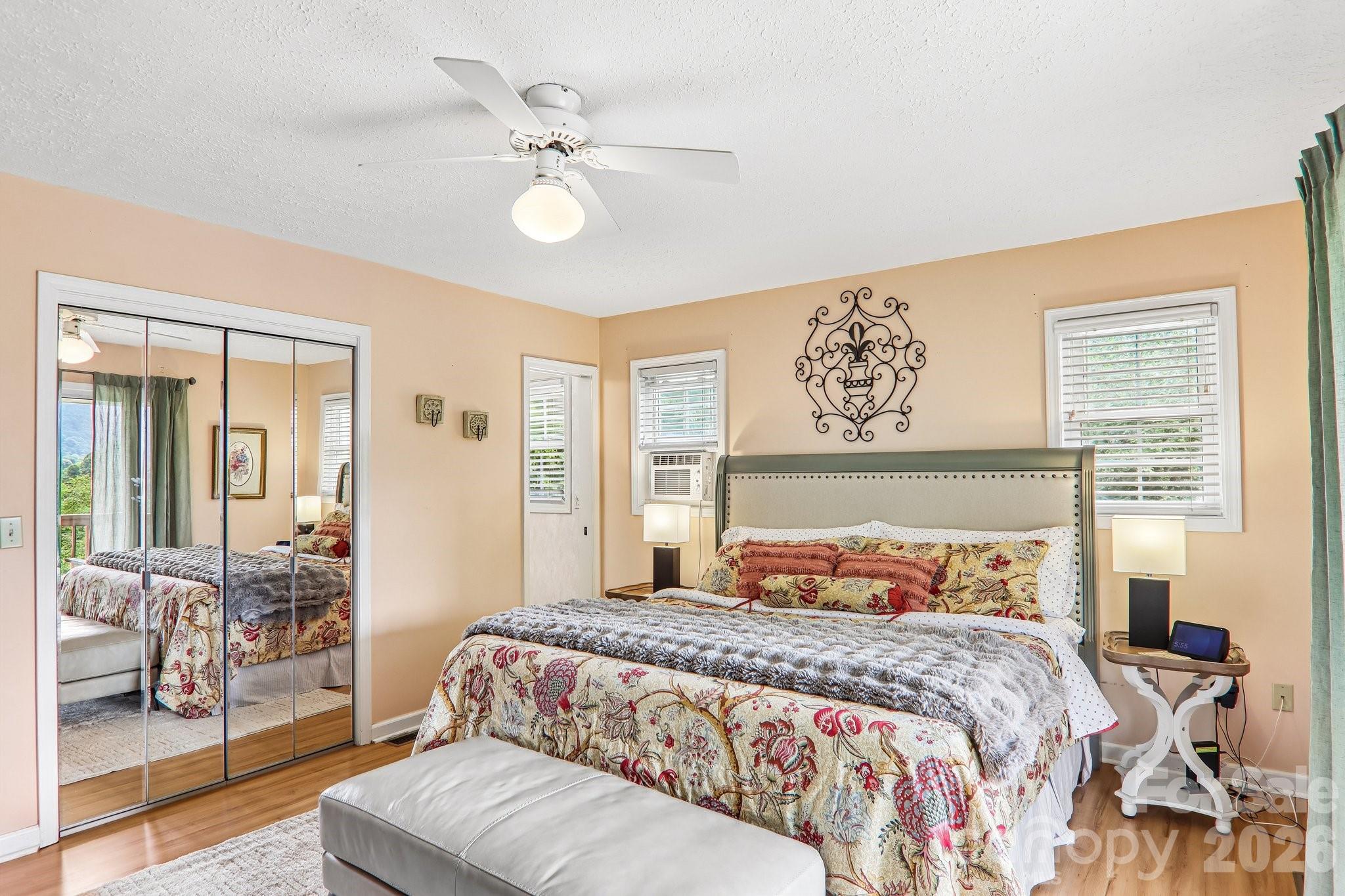 Primary bedroom with mirrored closet - 169 Highview Drive, Maggie Valley