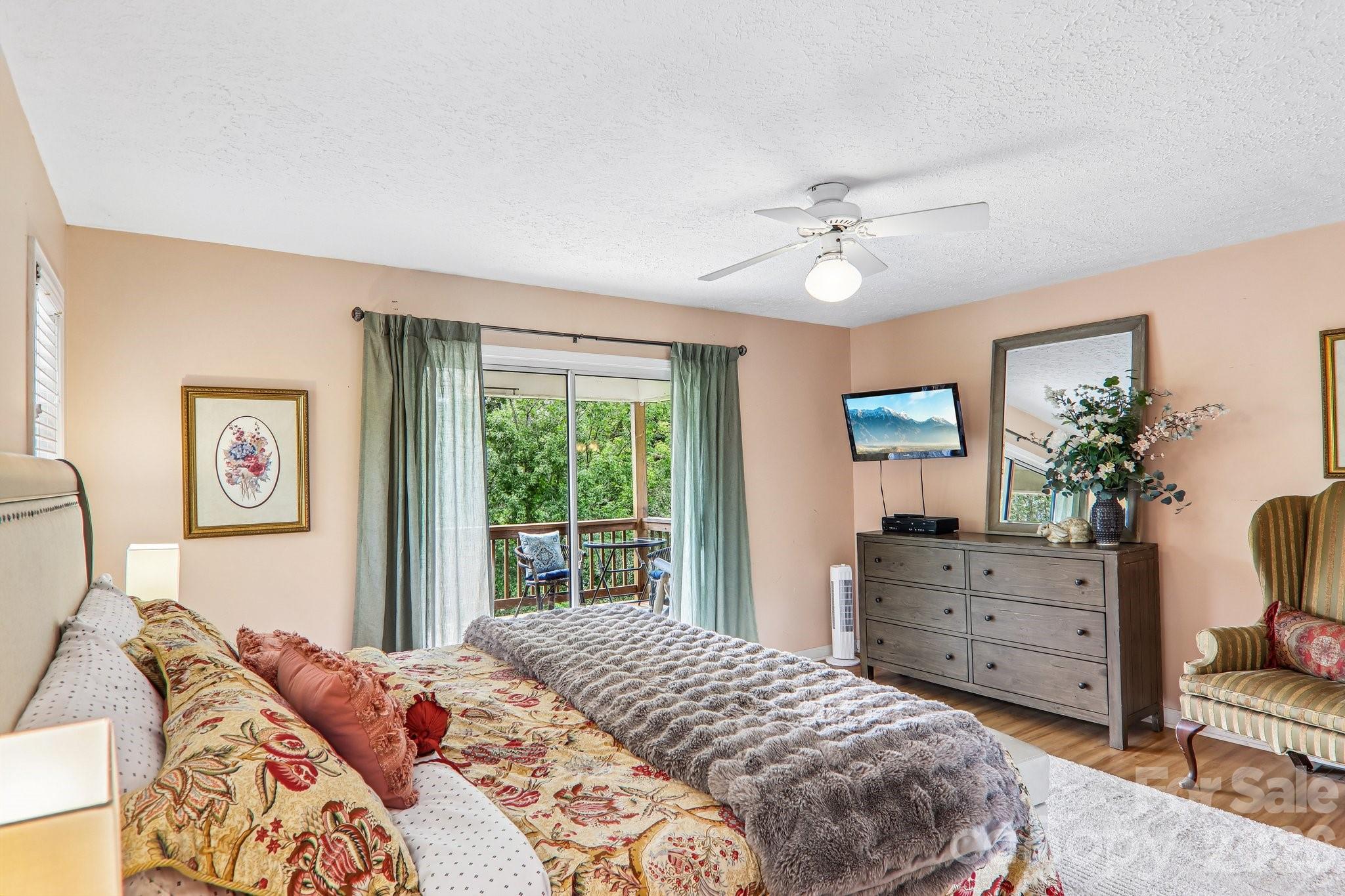 Primary bedroom, sliders open on to deck - 169 Highview Drive, Maggie Valley