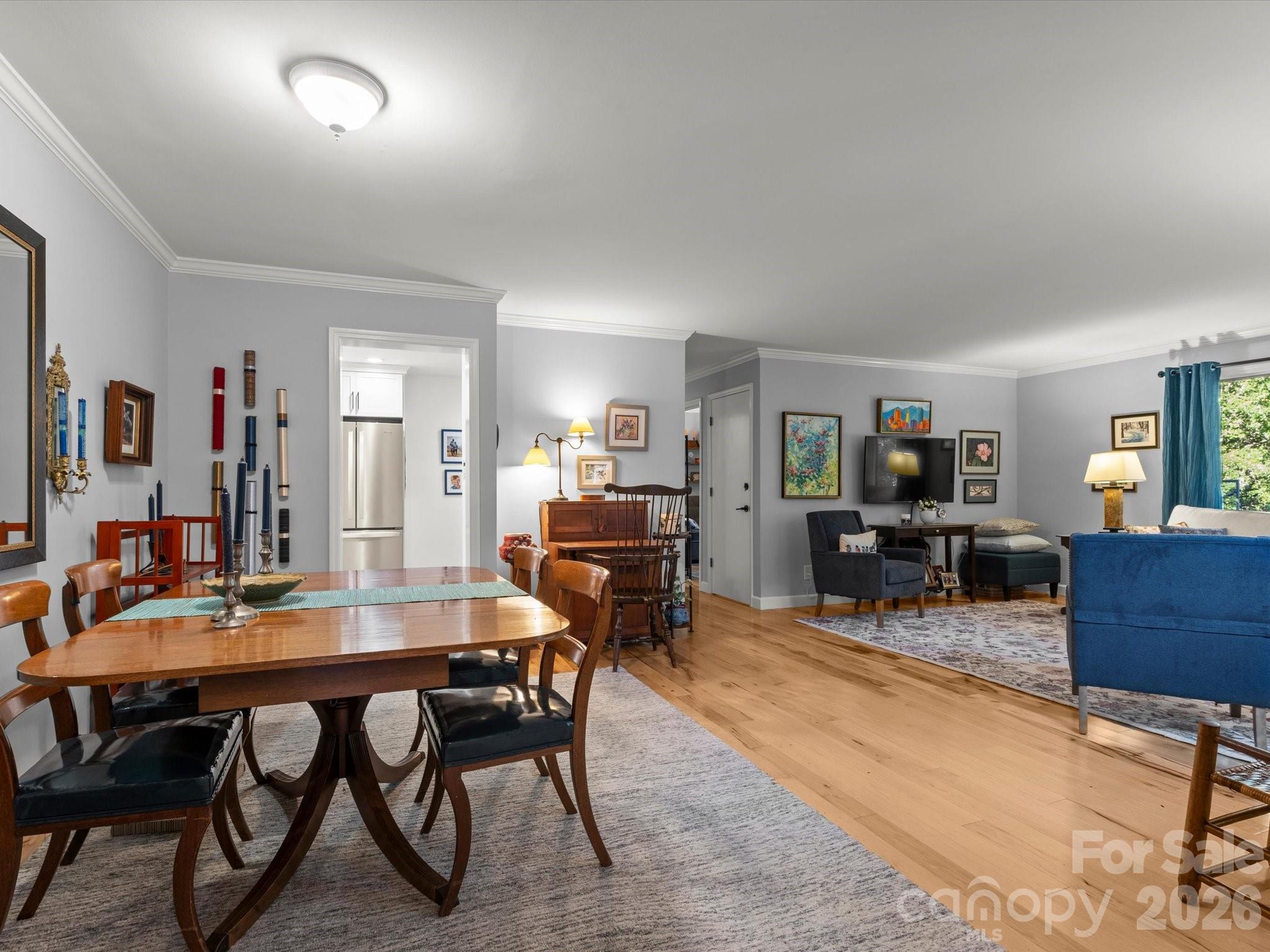 A wam and inviting layout that connects dining to living - 110 Aurora Drive, Asheville