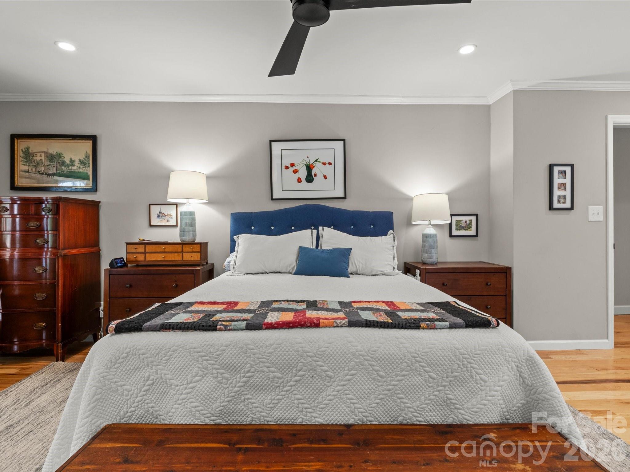 The expansive main level primary bedroom is a true retreat - 110 Aurora Drive, Asheville