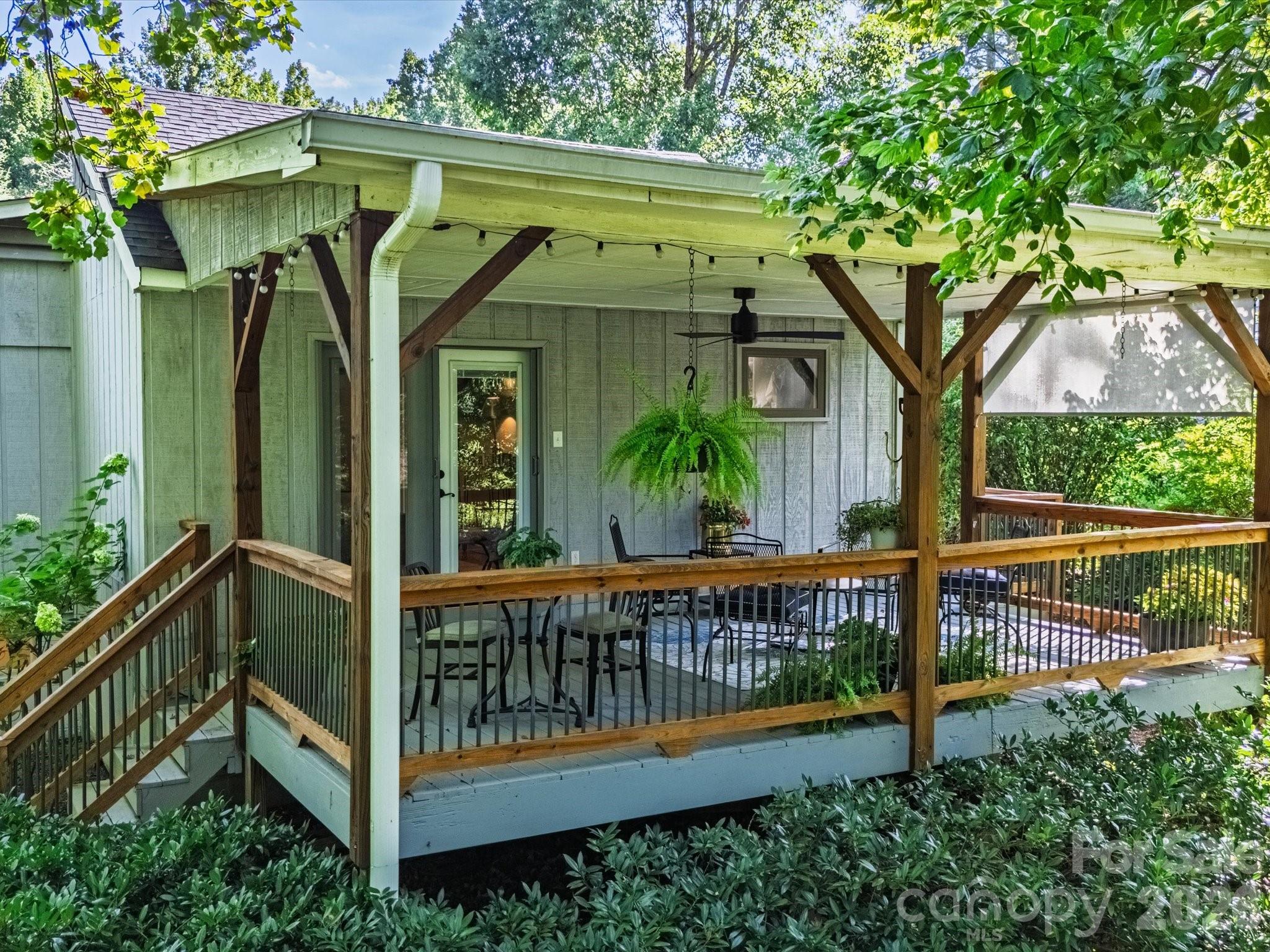 Covered, private back deck off the primary bedroom - 110 Aurora Drive, Asheville