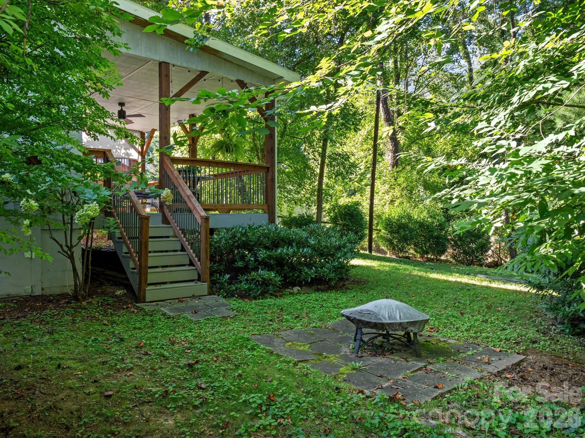 Private fire pit space among the trees - 110 Aurora Drive, Asheville