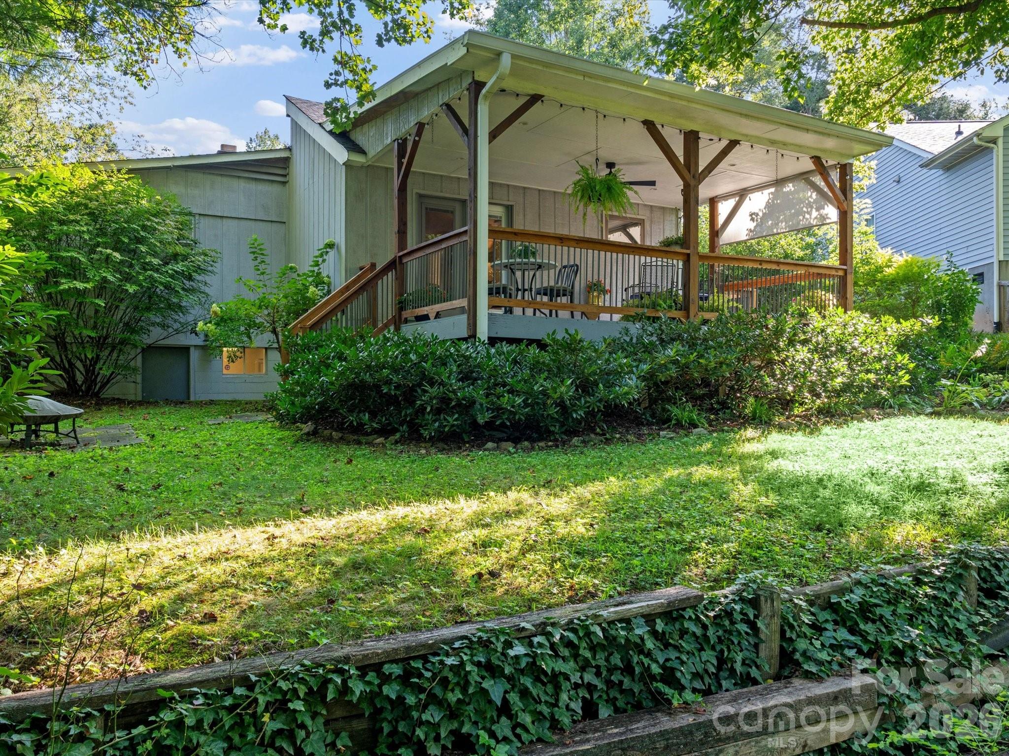 Access to the backyard from the back deck - 110 Aurora Drive, Asheville