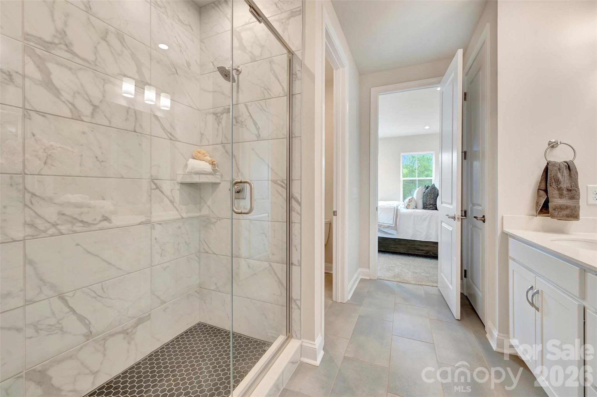 Primary bathroom with a a tiled walk-in shower - 309 Old Town Village Road, Waxhaw