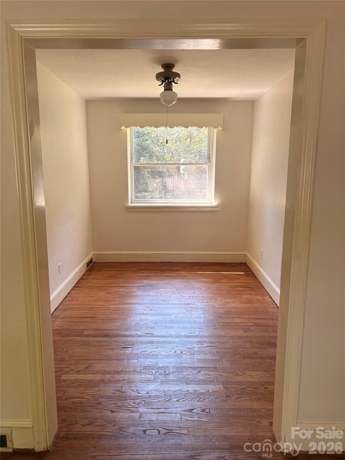 Fresh paint and re-finished wood flooring. - 725 5th Avenue SW, Hickory