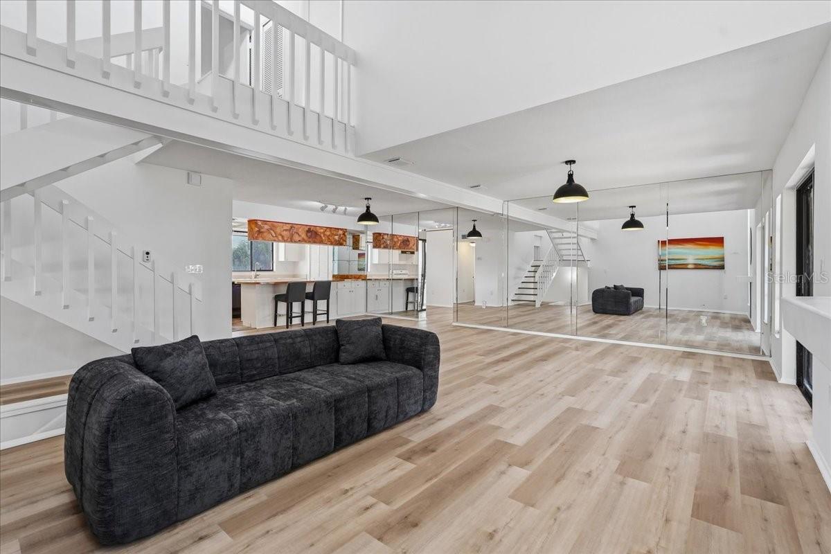 Vaulted Ceiling provides an overlook from the Double Primary Bedrooms - 240 WINDWARD PSGE #702, CLEARWATER