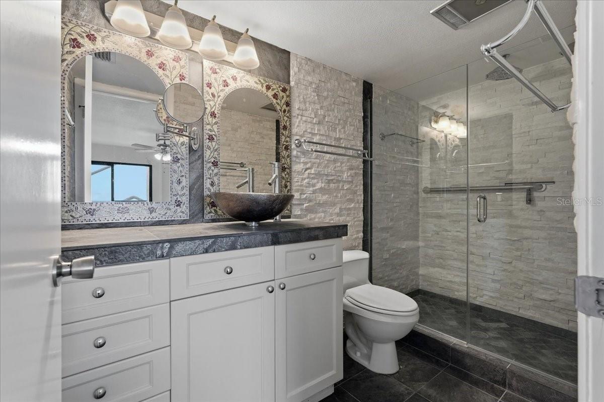 Primary Suite #1 fully updated Bathroom - 240 WINDWARD PSGE #702, CLEARWATER