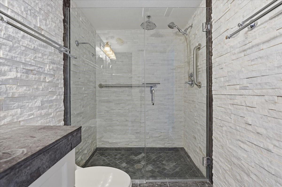 Primary Suite #1 fully updated Bathroom - 240 WINDWARD PSGE #702, CLEARWATER