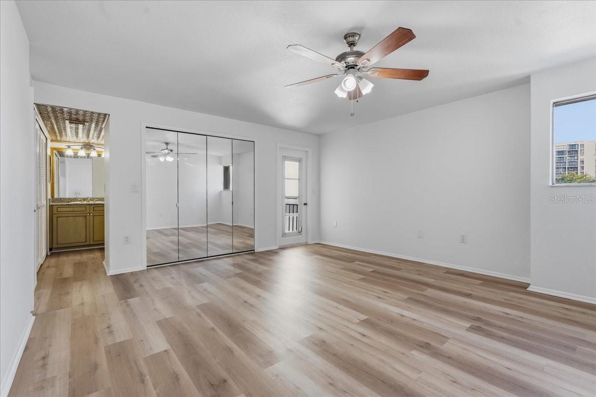 Primary Suite #2 boasts ample storage with dual closets and a linen closet as well - 240 WINDWARD PSGE #702, CLEARWATER