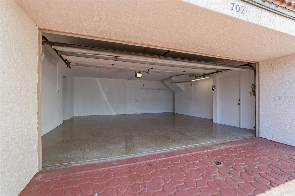 Spacious Two Car Garage with work room and exceptional climate controlled Bonus Space - 240 WINDWARD PSGE #702, CLEARWATER