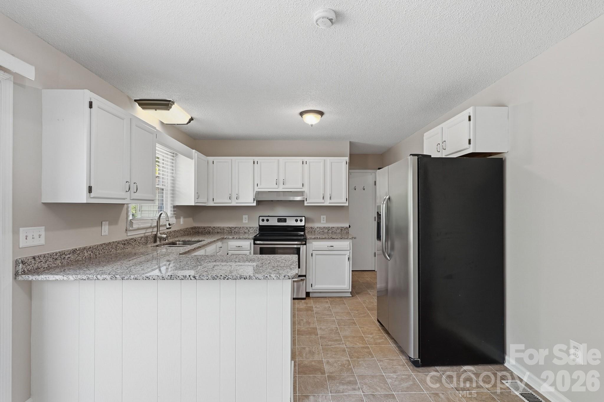 Single Family Residence at 3028 Dylan Place NW, Concord, photo 5 of 25