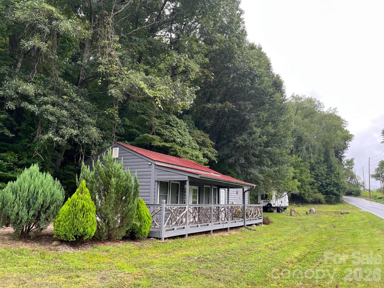 Busy corner location on Cane Creek and Gap Creek Roads. - 1961 Cane Creek Road, Fletcher
