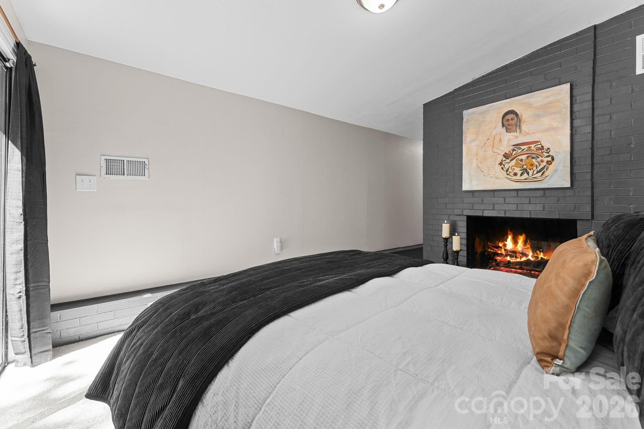 Primary Bedroom with Fireplace - 103 Riverwood Drive, Sylva