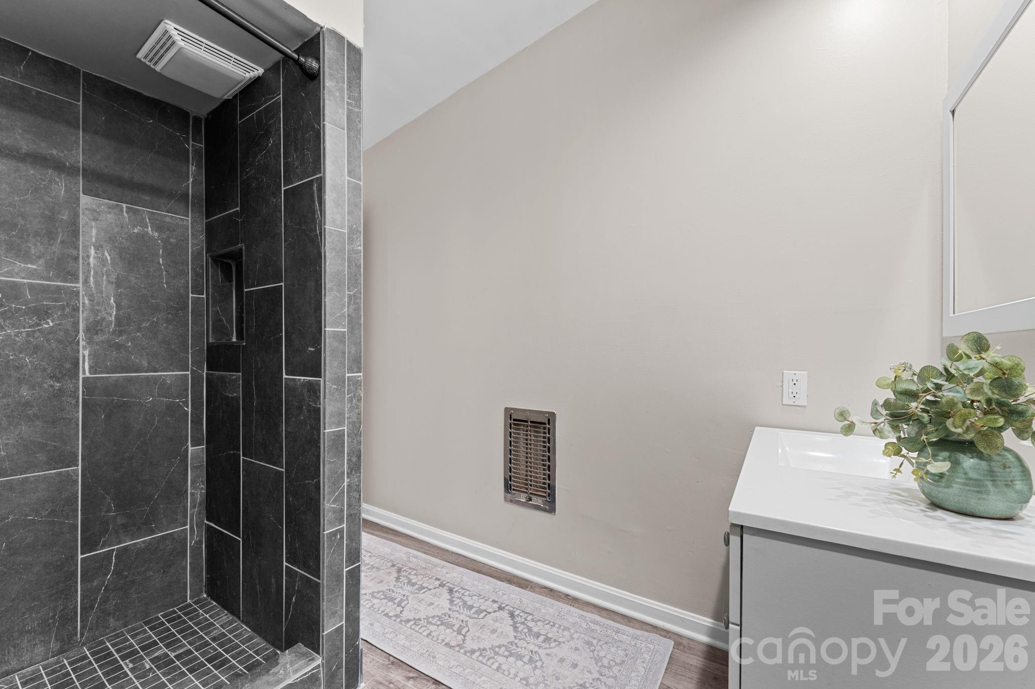 Remodeled Hall Bathroom - 103 Riverwood Drive, Sylva