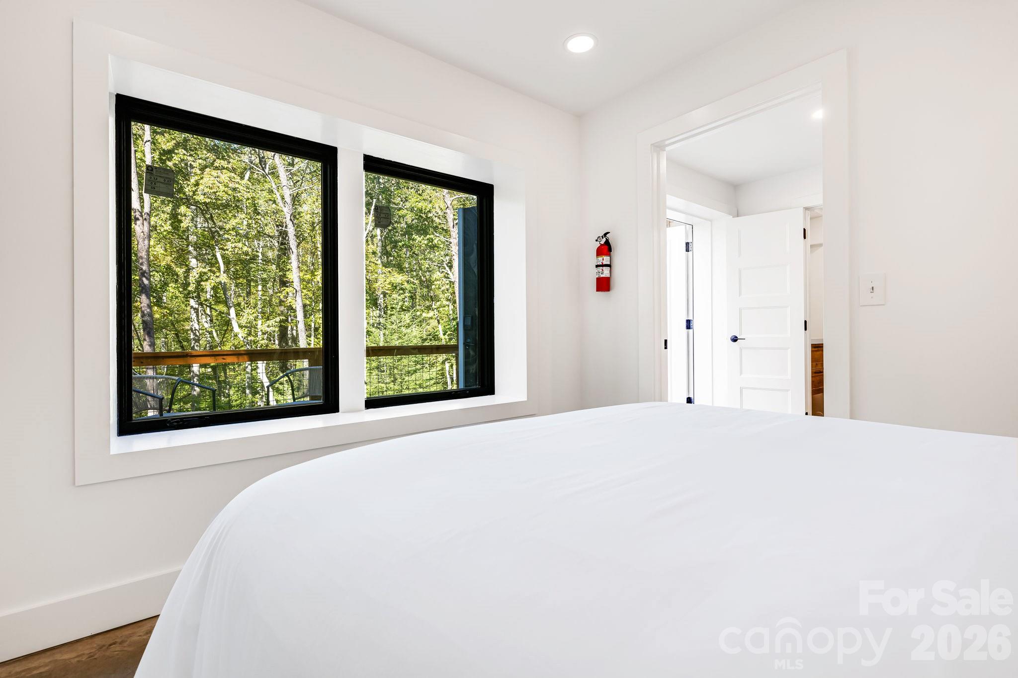 Single Family Residence at 56 Creek Run Road, Candler, photo 8 of 37
