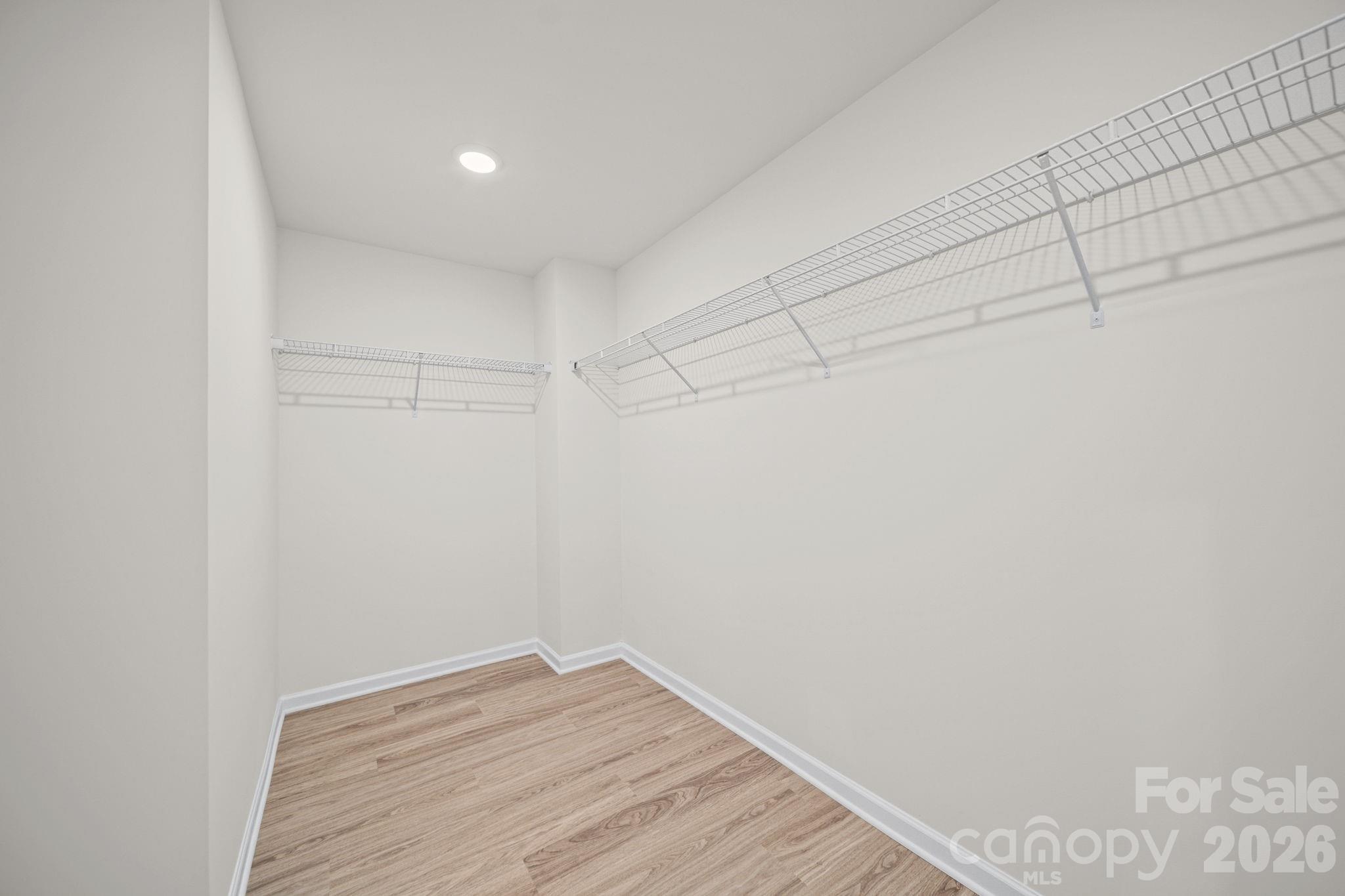 Primary Bedroom Walk-in Closet - 203 Hermitage Court, Shelby