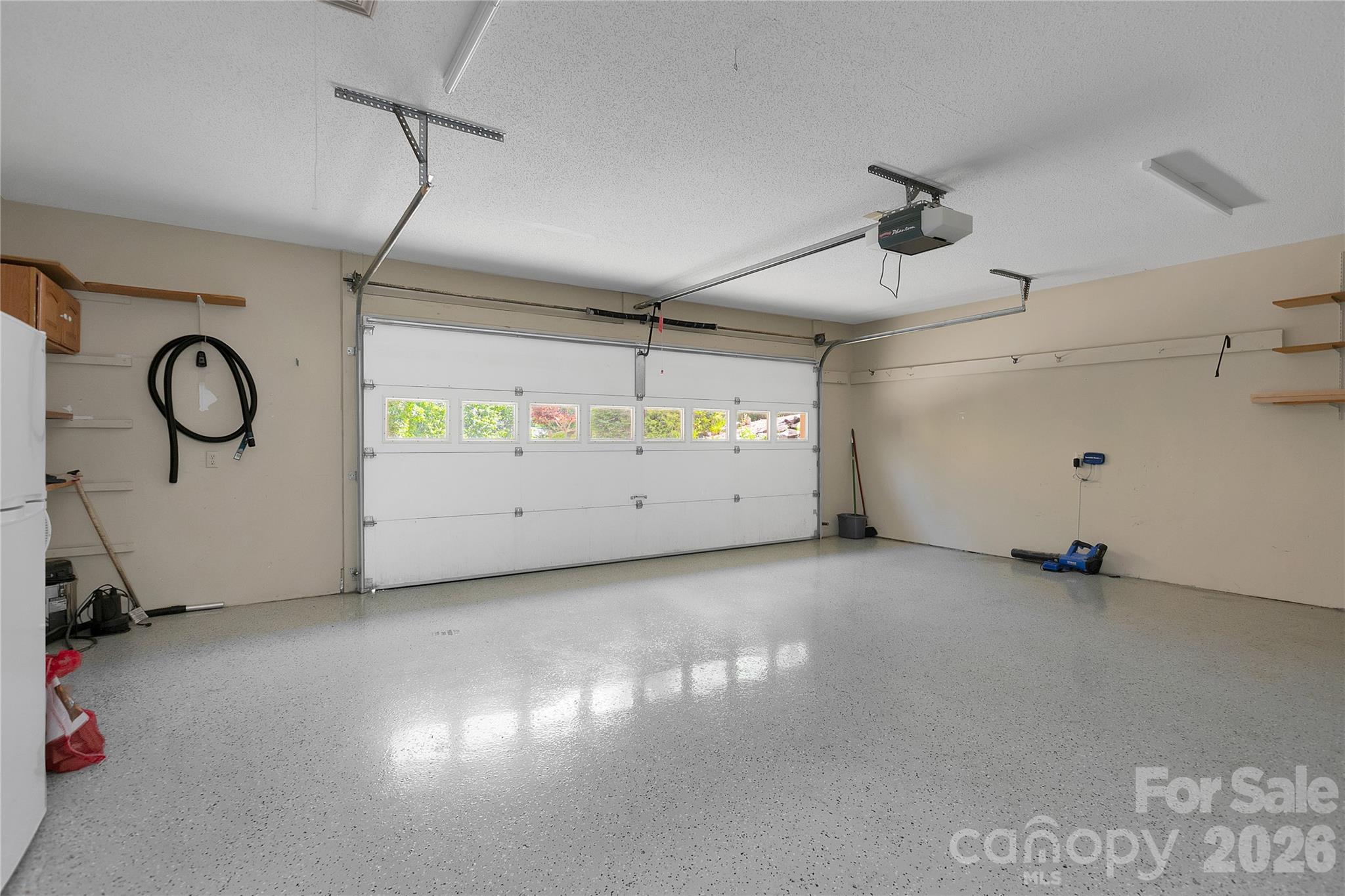Apoxycrete coating on garage floor - 157 Kawani Lane, Brevard