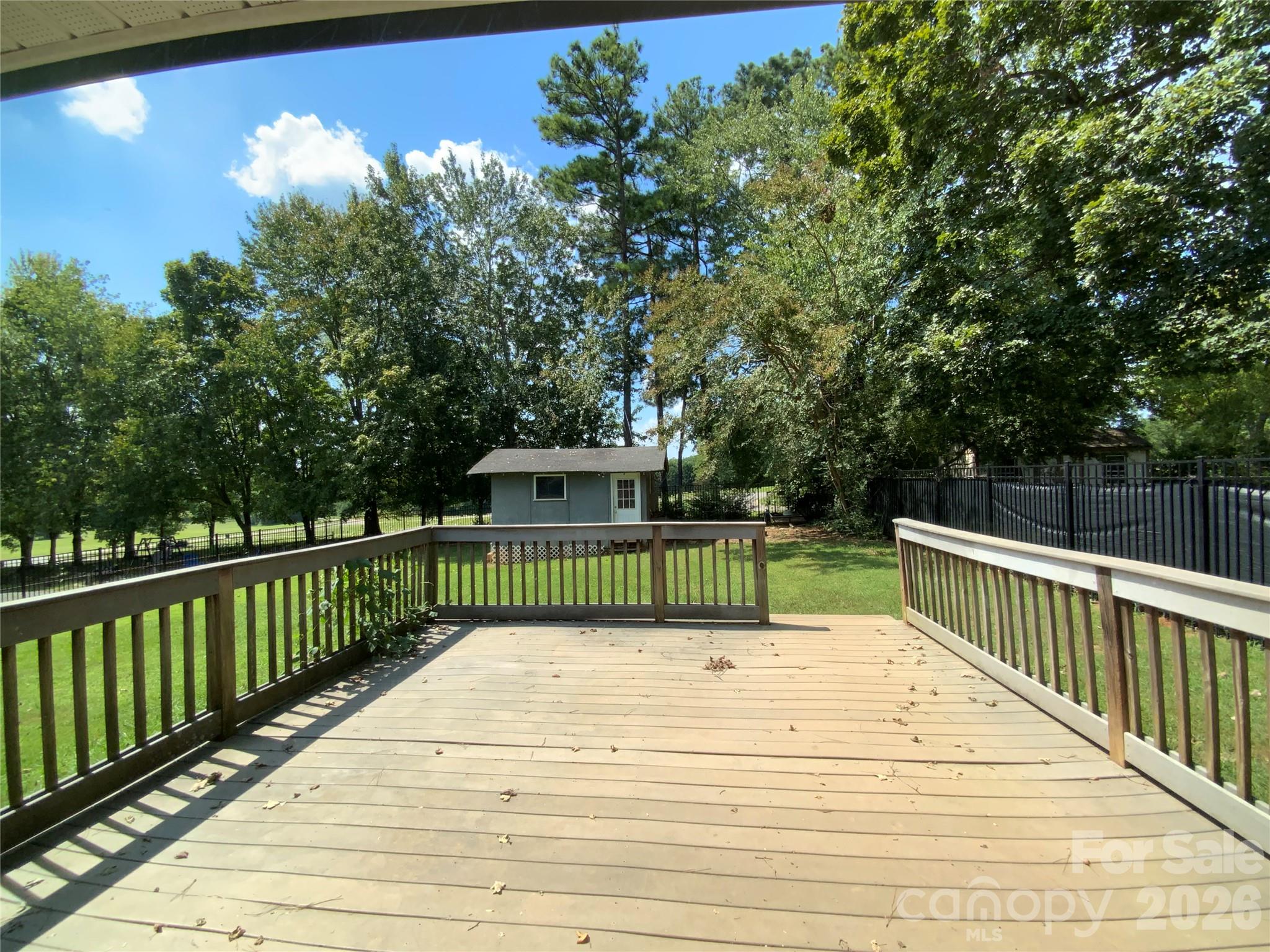 Spaious deck to enjoy reading a novel, a cup of coffee or for entertaining. - 325 Glenwood Drive, Mooresville