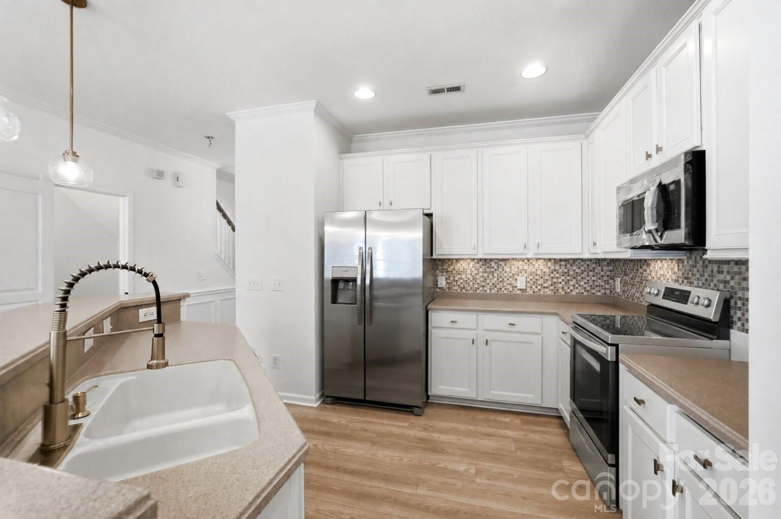 Oven/range virtually added as it was not installed at time of photos. Exact model is photoshopped into the picture - 461 River Park Road, Belmont