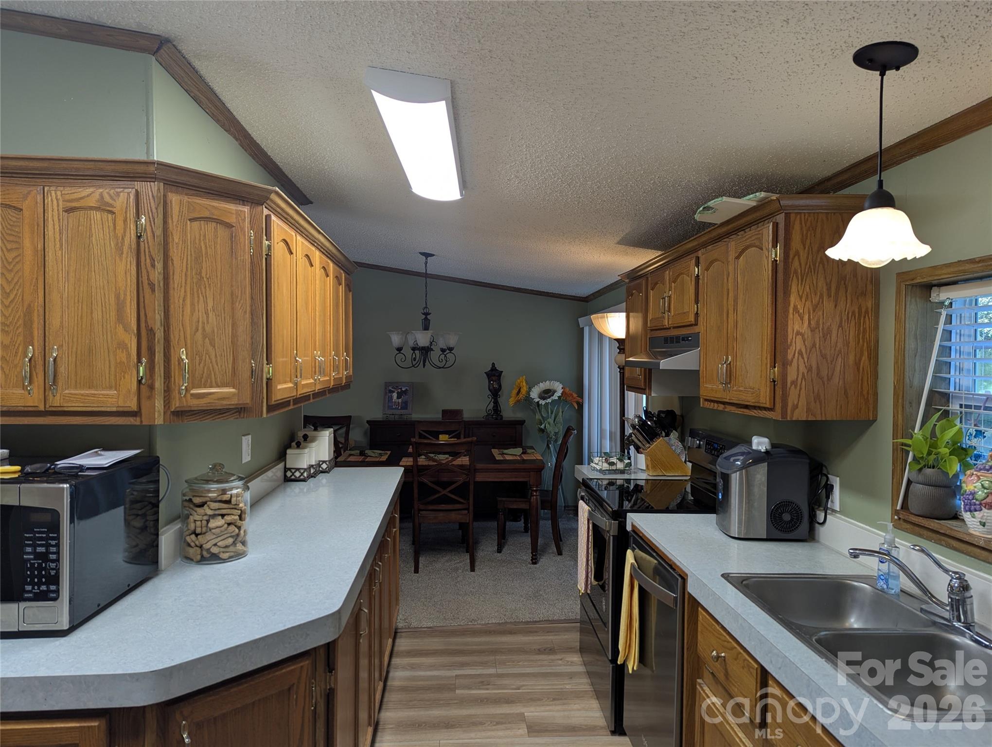 Note, new kitchen light replaced old fixture - 6846 Potter Road, Matthews