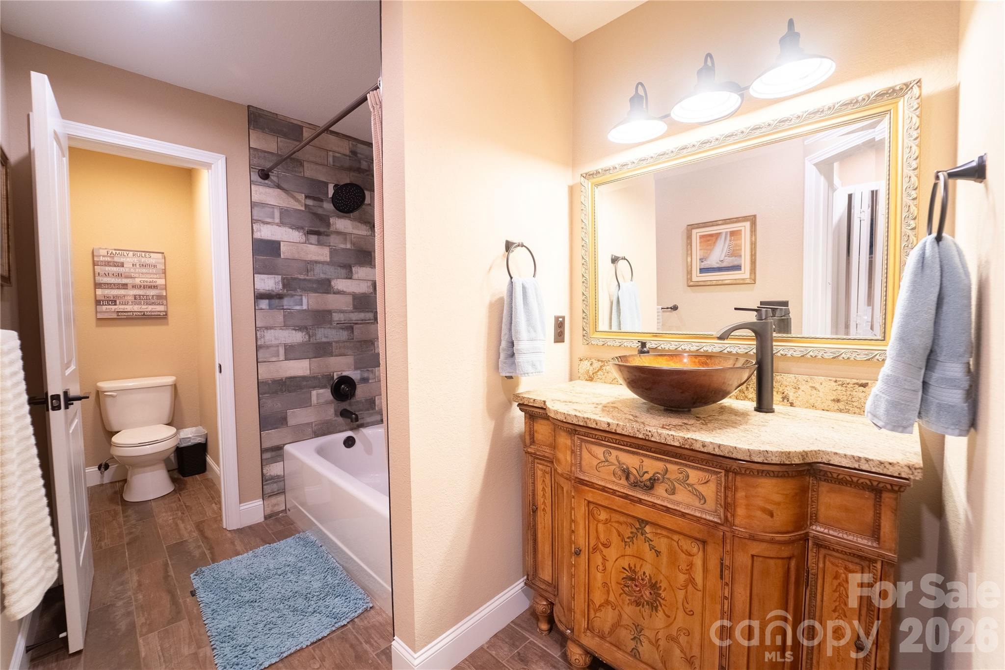 bottom level full bath - 142 W Southwood Drive, Brevard