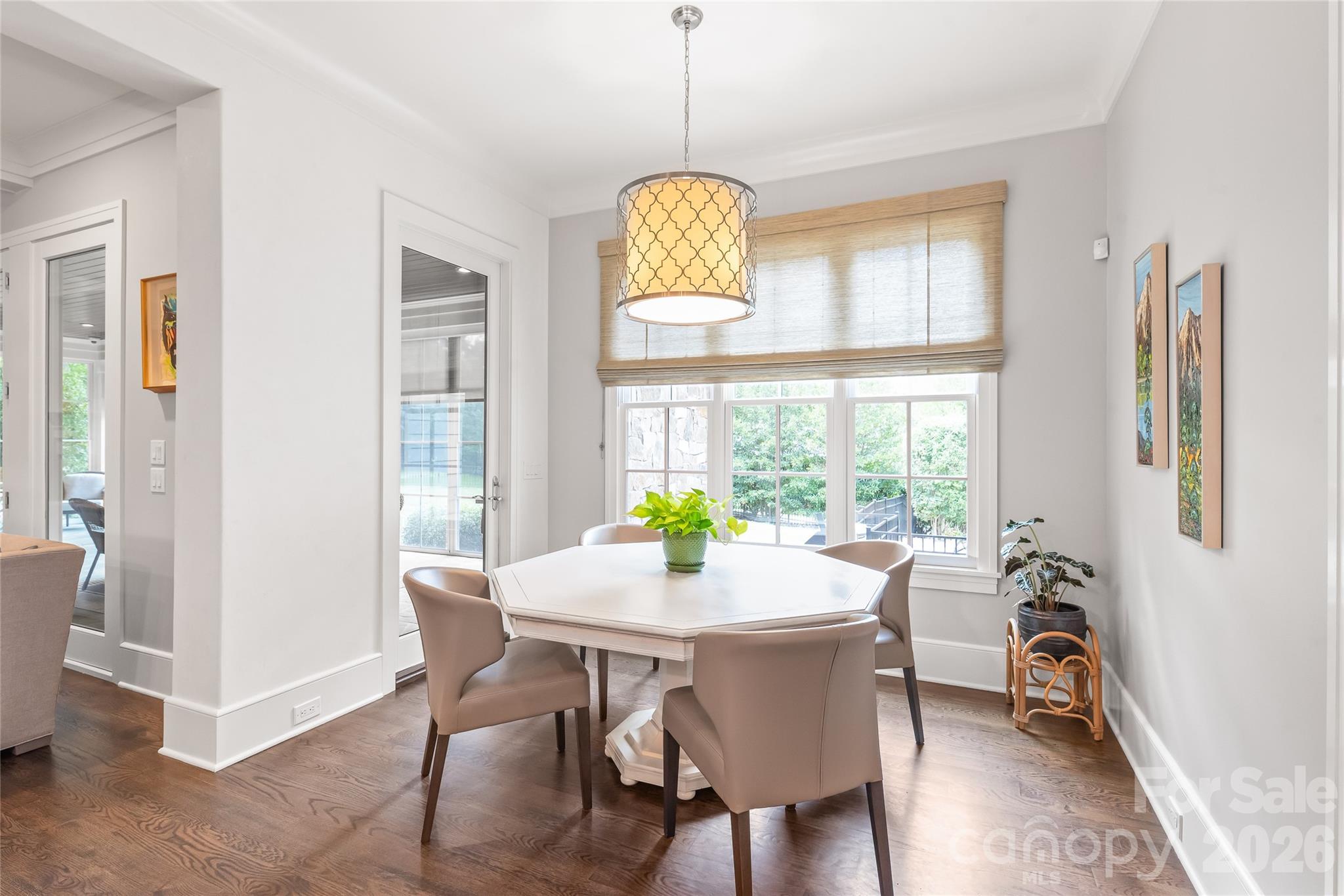 A breakfast area with a view. Entry to 3 season room and overlooking the back yard - 2800 Wintergreen Drive, Charlotte