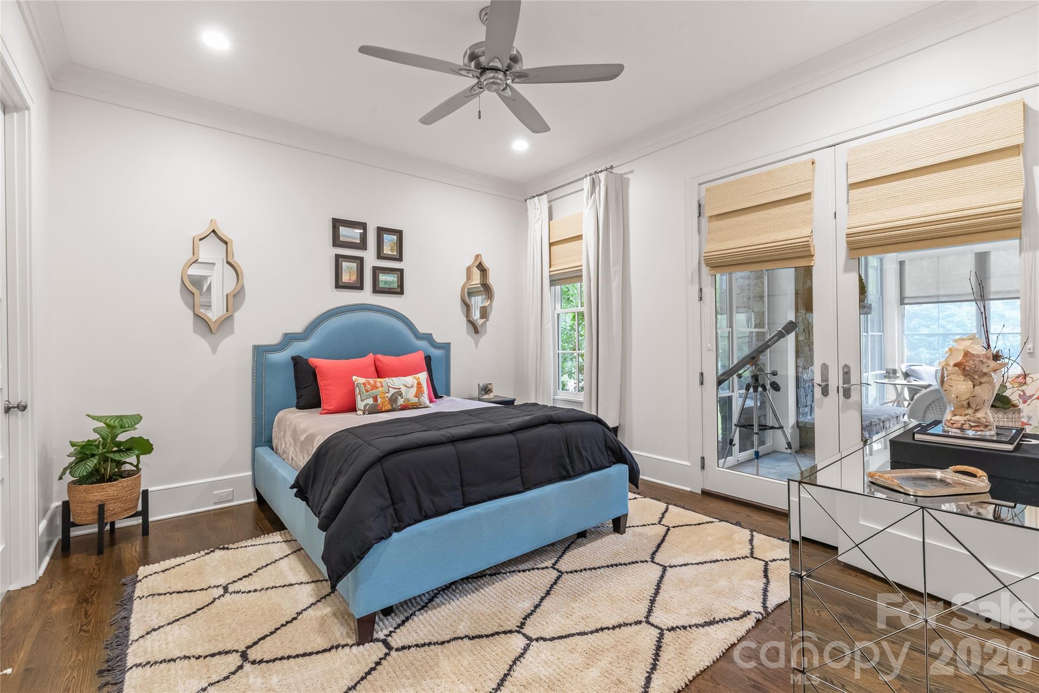 A main floor guest room suite tucked away for privacy, with its own entry to the 3 season room. - 2800 Wintergreen Drive, Charlotte