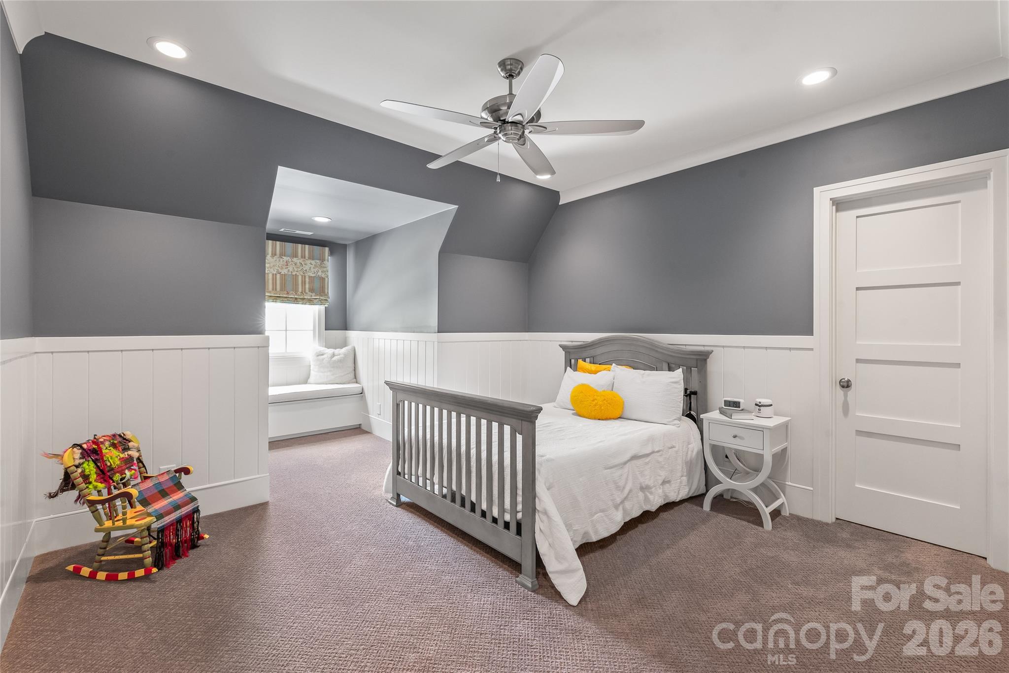 Guest rooms are roomy and bright. Wooden wainscoting and other details were not forgotten here. - 2800 Wintergreen Drive, Charlotte