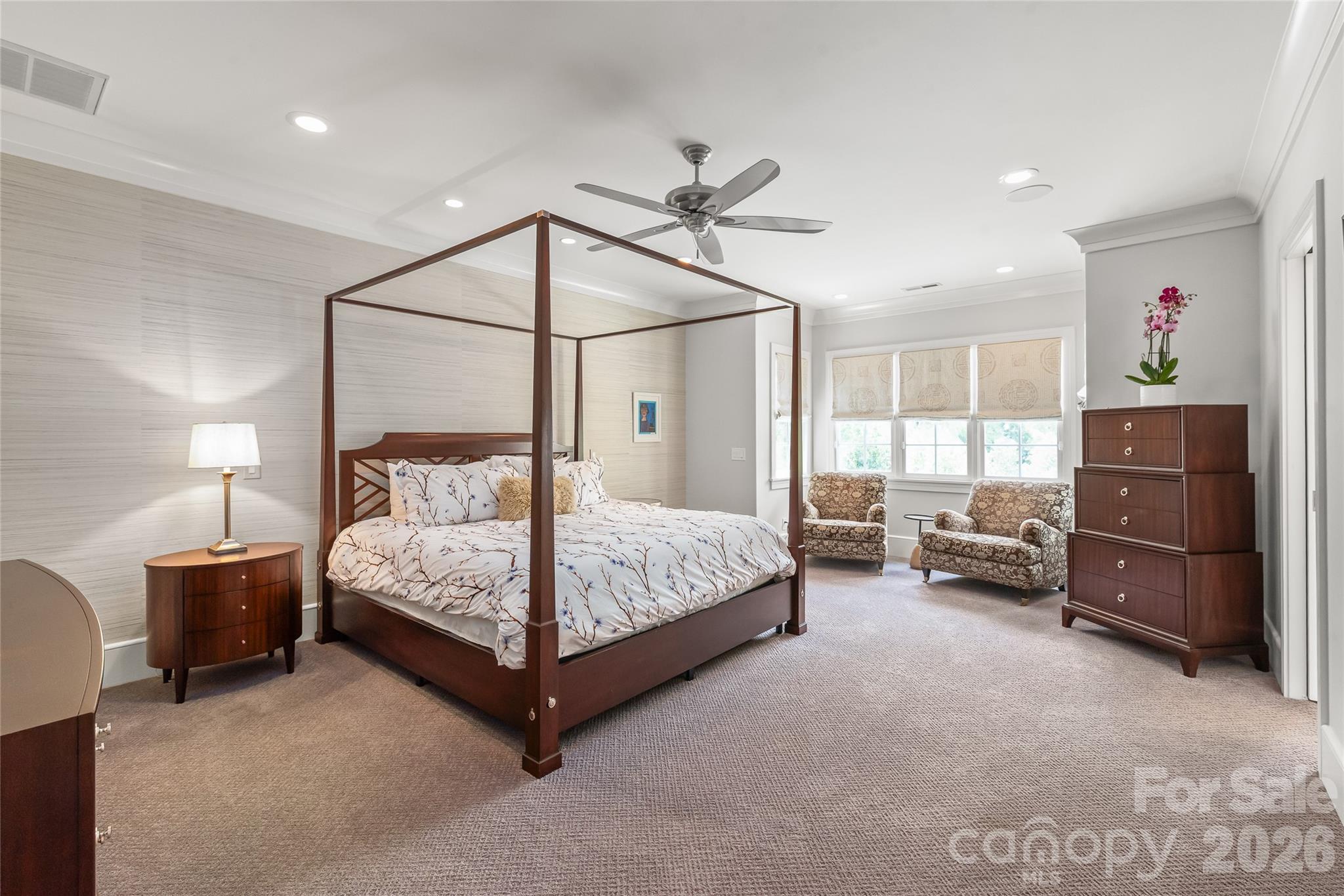 The Primary is open and enjoys its own sitting area. - 2800 Wintergreen Drive, Charlotte