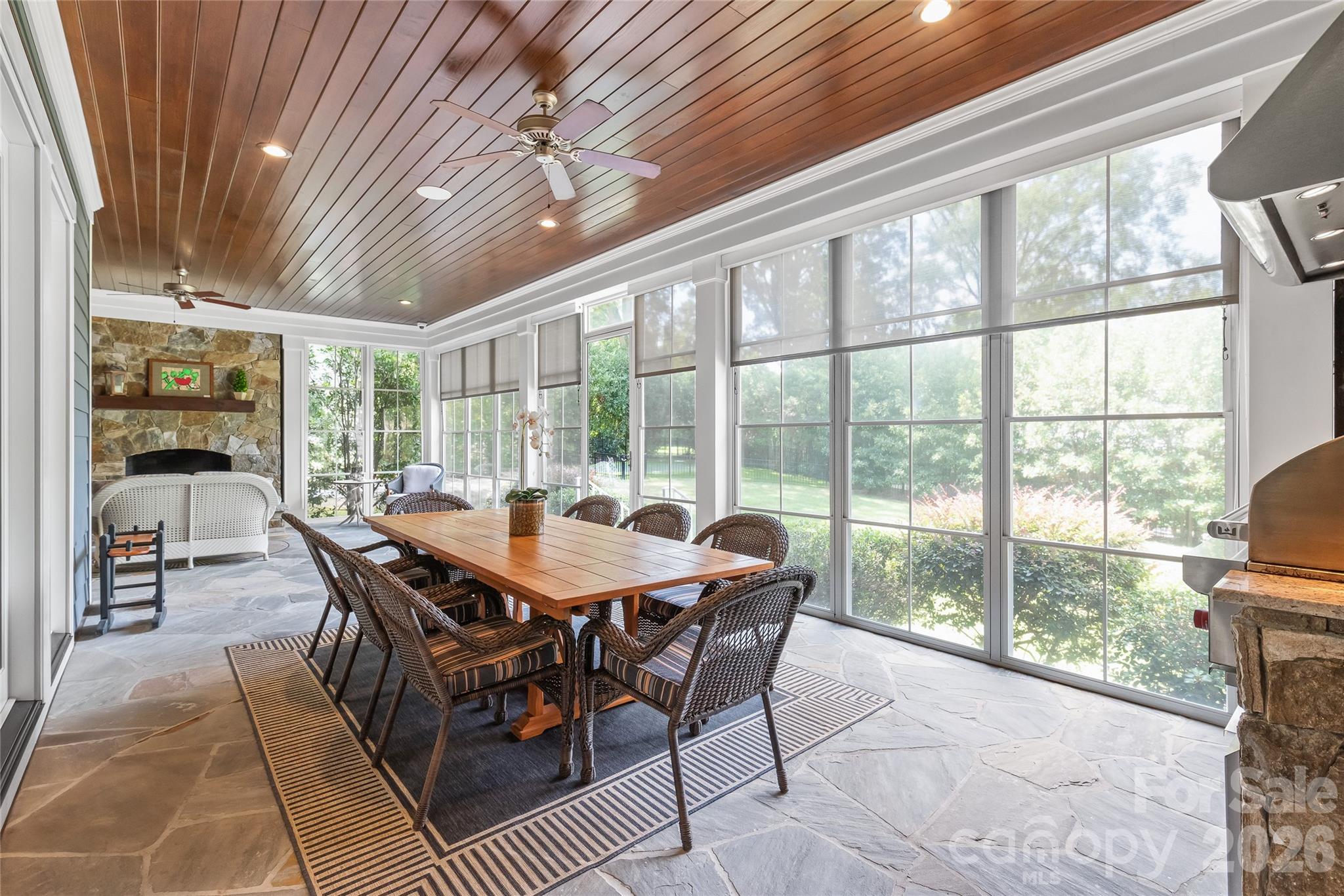 The perfect addition. This three-season room has it all. With EZE-Breeze windows you can enjoy this wonderful space for much of the year - 2800 Wintergreen Drive, Charlotte