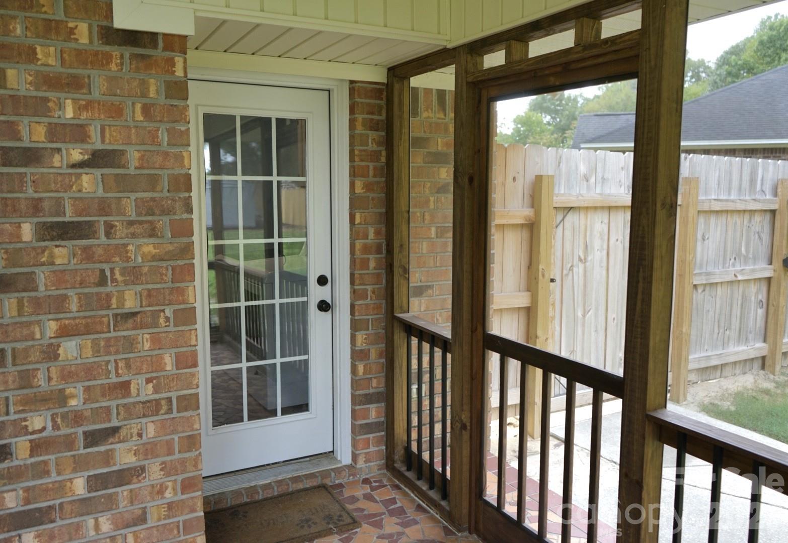Covered Screened-In Porch and Back Door - 1035 Waterway Drive, Sumter