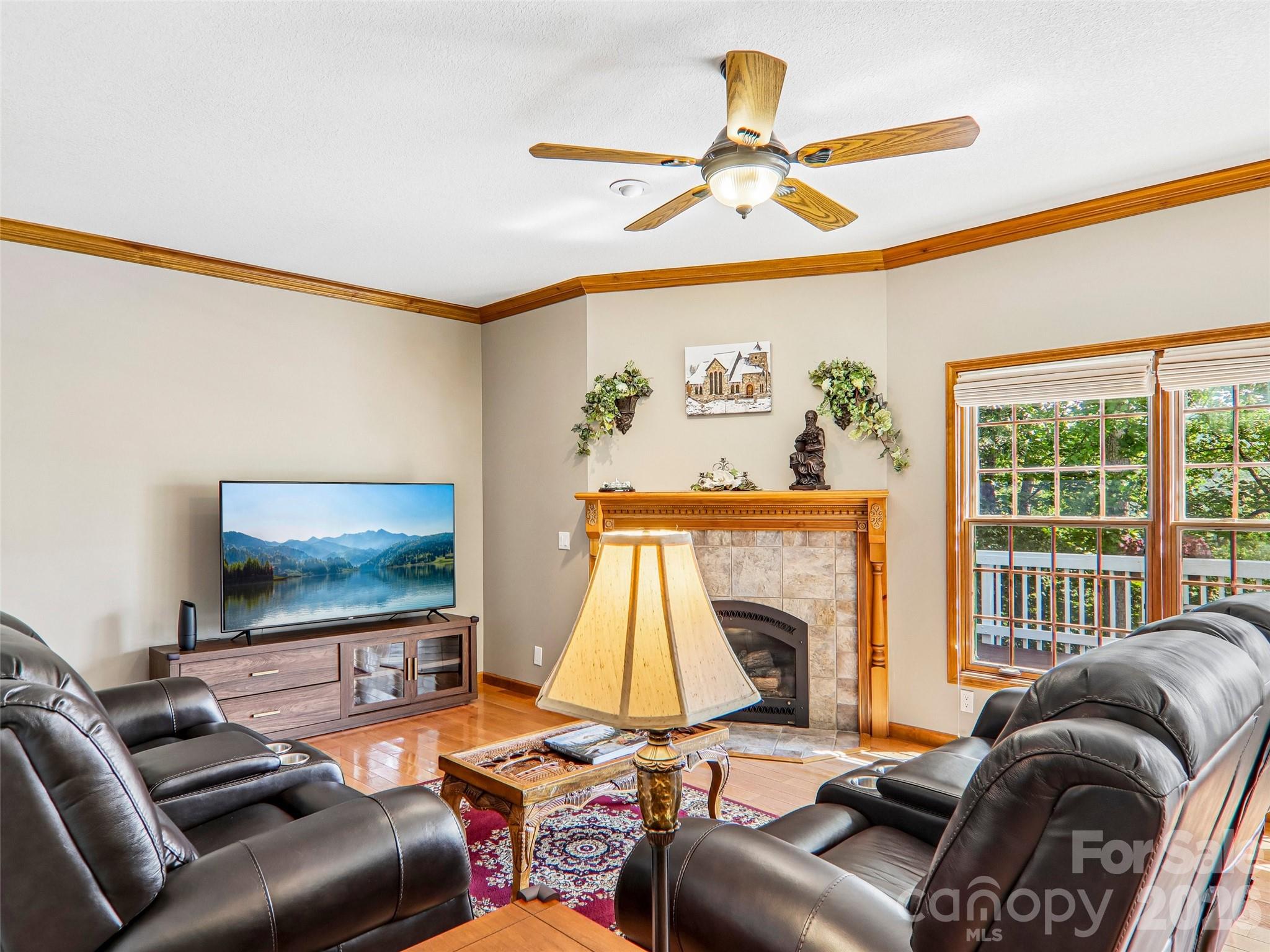 Living room showcasing the vented fireplace. - 16 Hobe Crest, Hendersonville