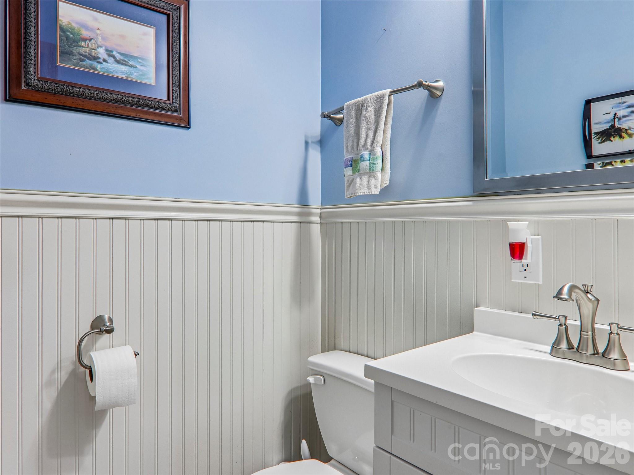 Half bath with wainscoting. - 16 Hobe Crest, Hendersonville