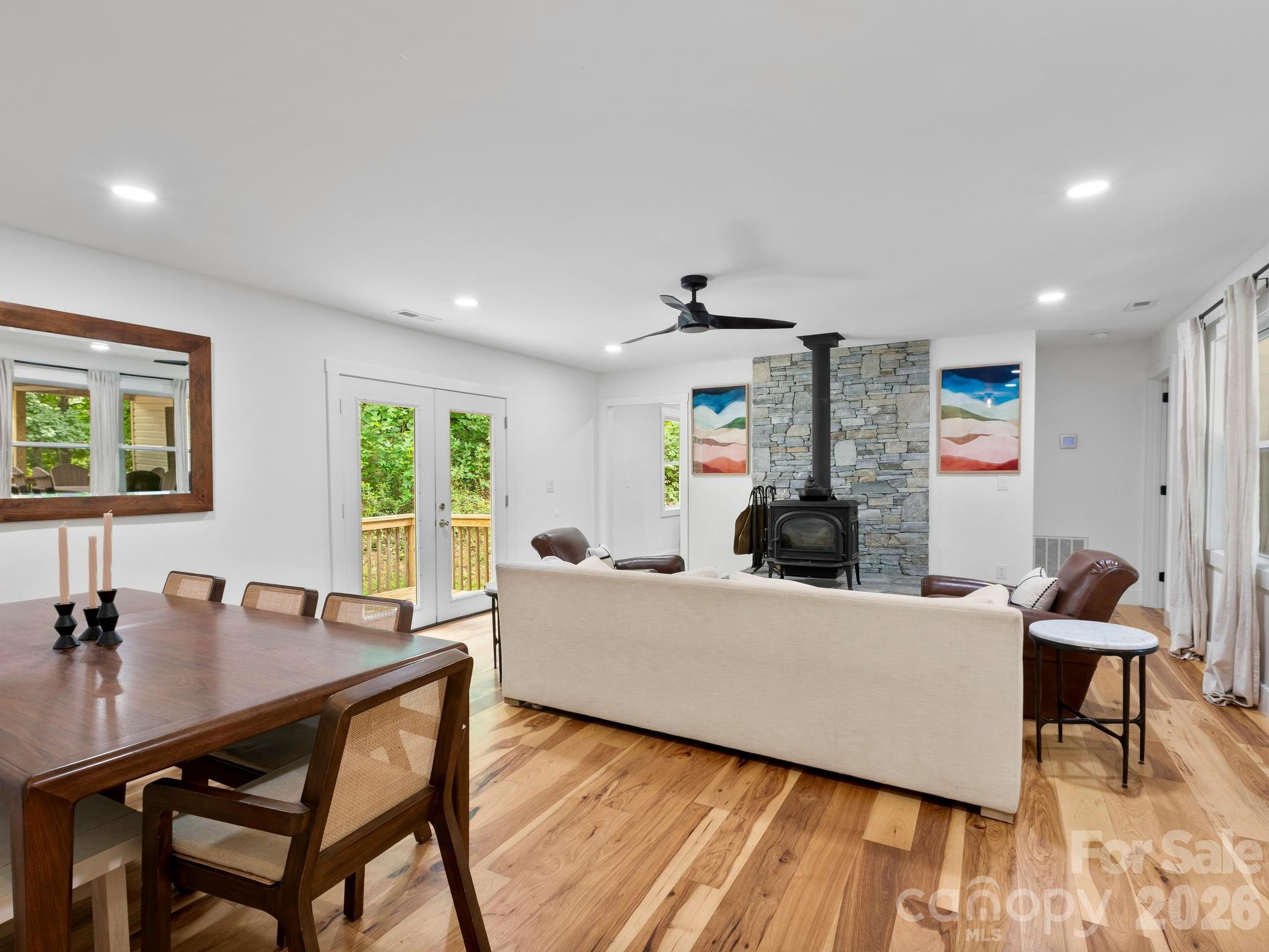 Spacious yet intimate living area joins with dining area. - 41 Bear Trail, Fairview
