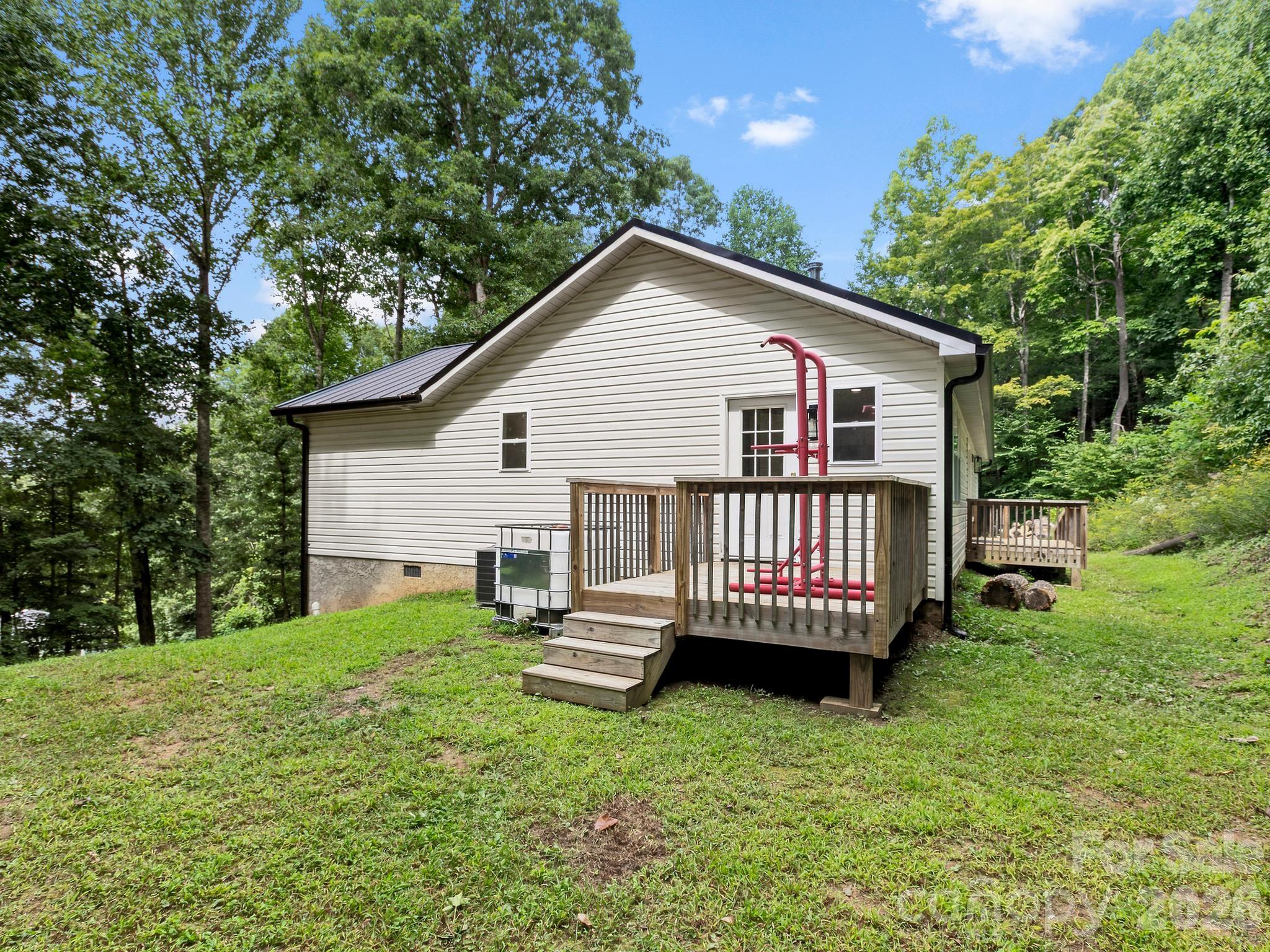 Side deck off of kitchen, perfect for grilling. - 41 Bear Trail, Fairview
