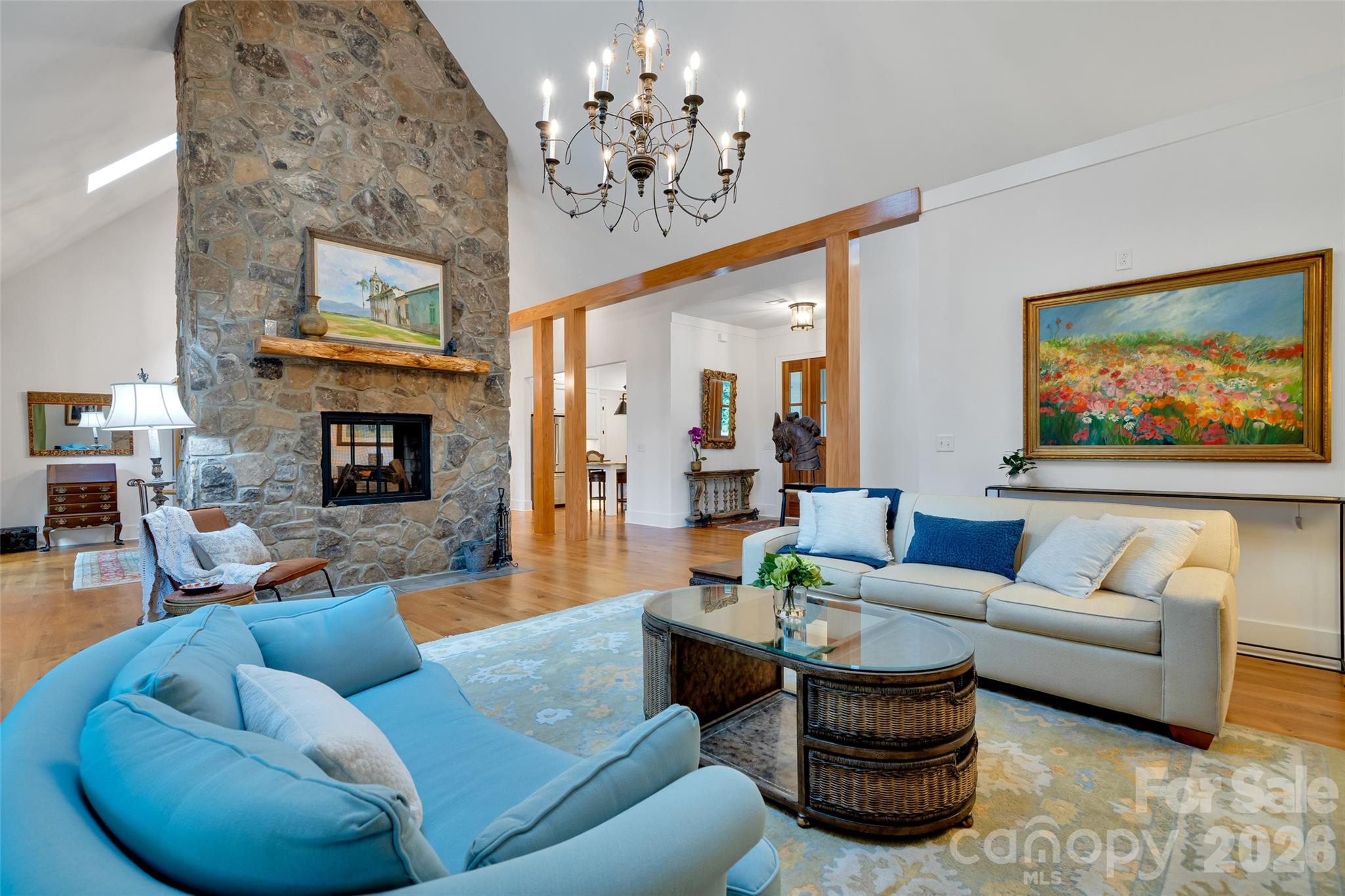 Great Room with cathedral ceilings and floor to ceiling stone fireplace - 442 Autumn Sky Drive, Hendersonville