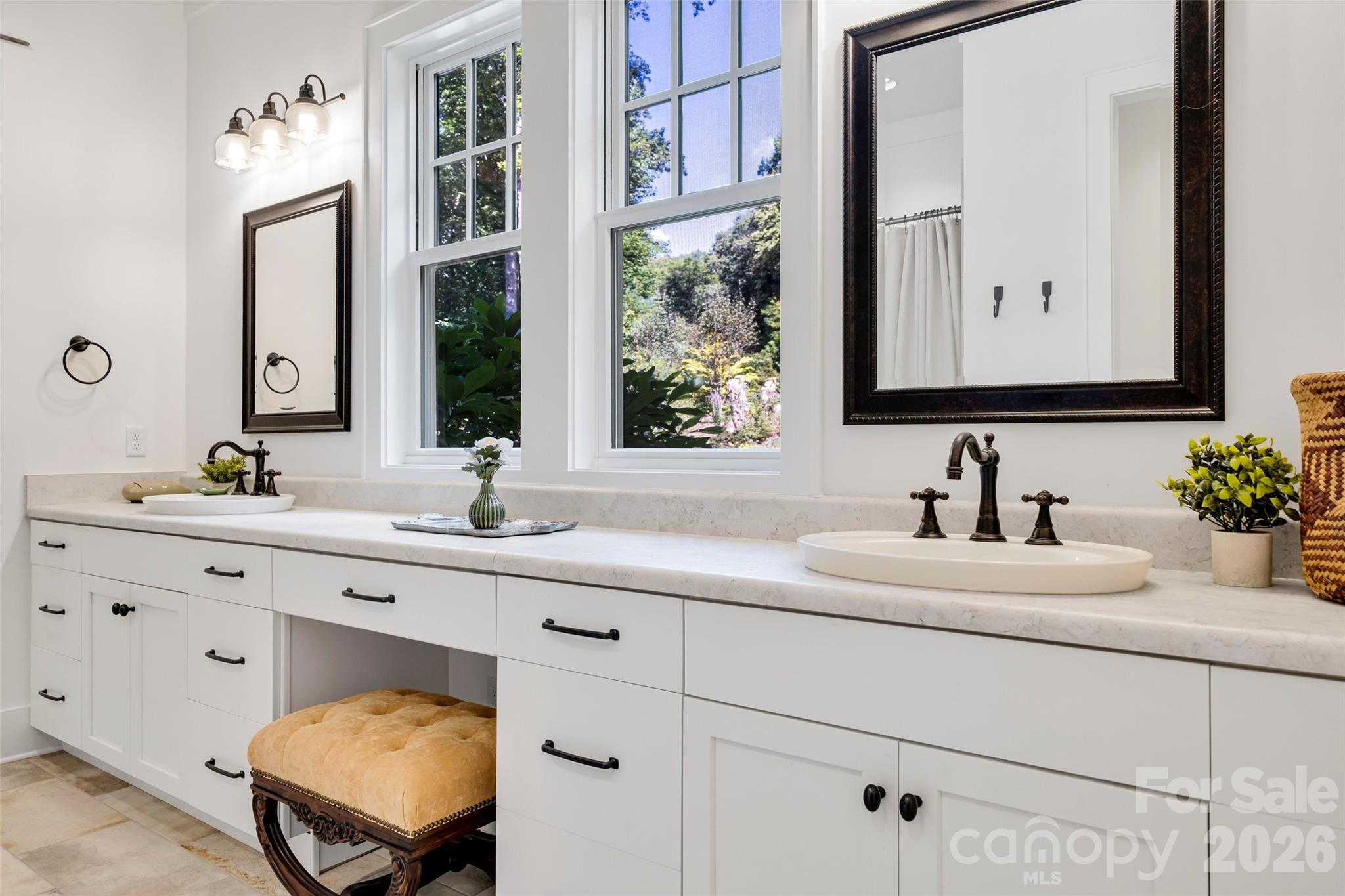 Primary bath with dual vanity and bright window - 442 Autumn Sky Drive, Hendersonville