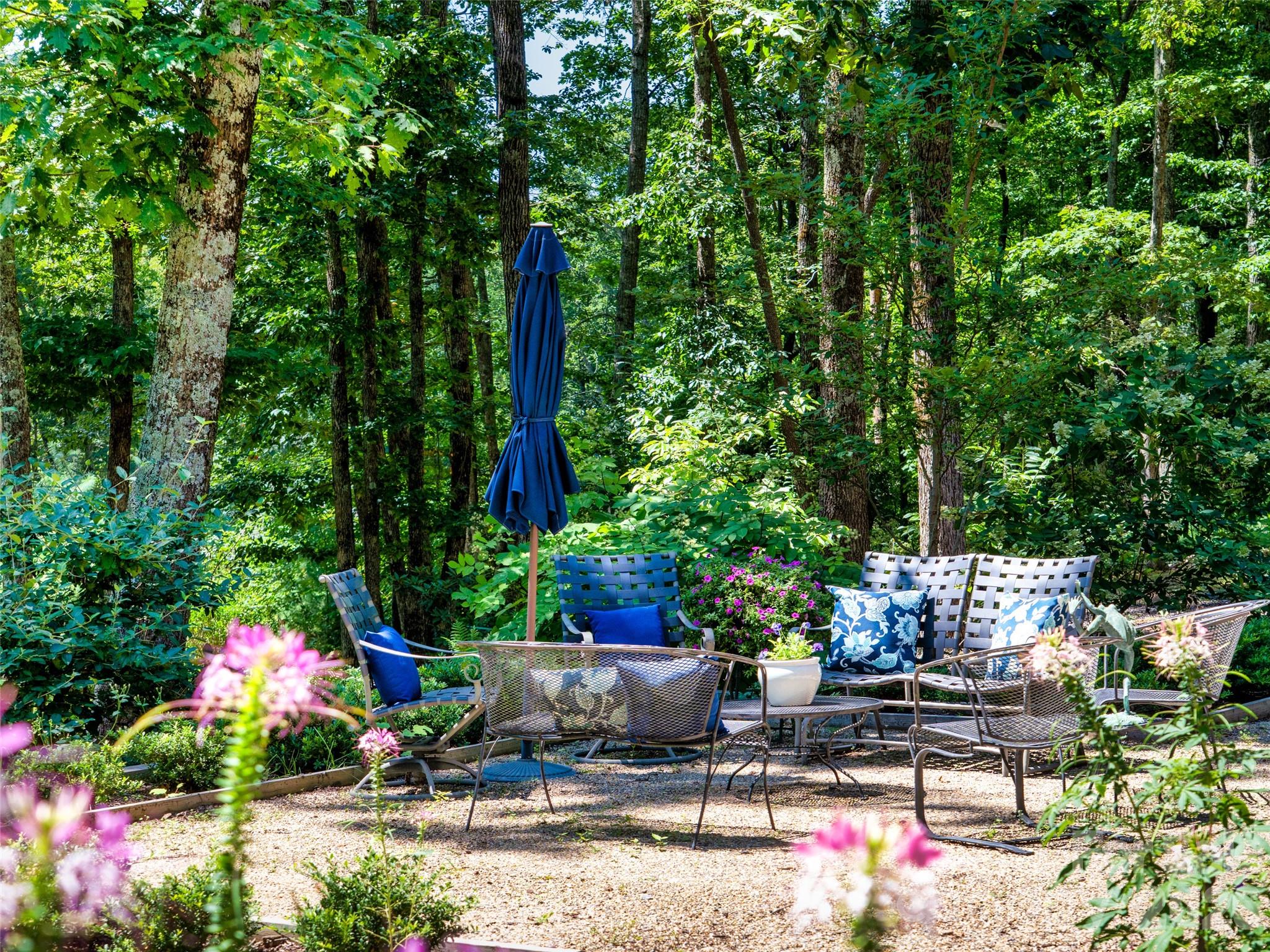 Lower patio with wooded view - 442 Autumn Sky Drive, Hendersonville