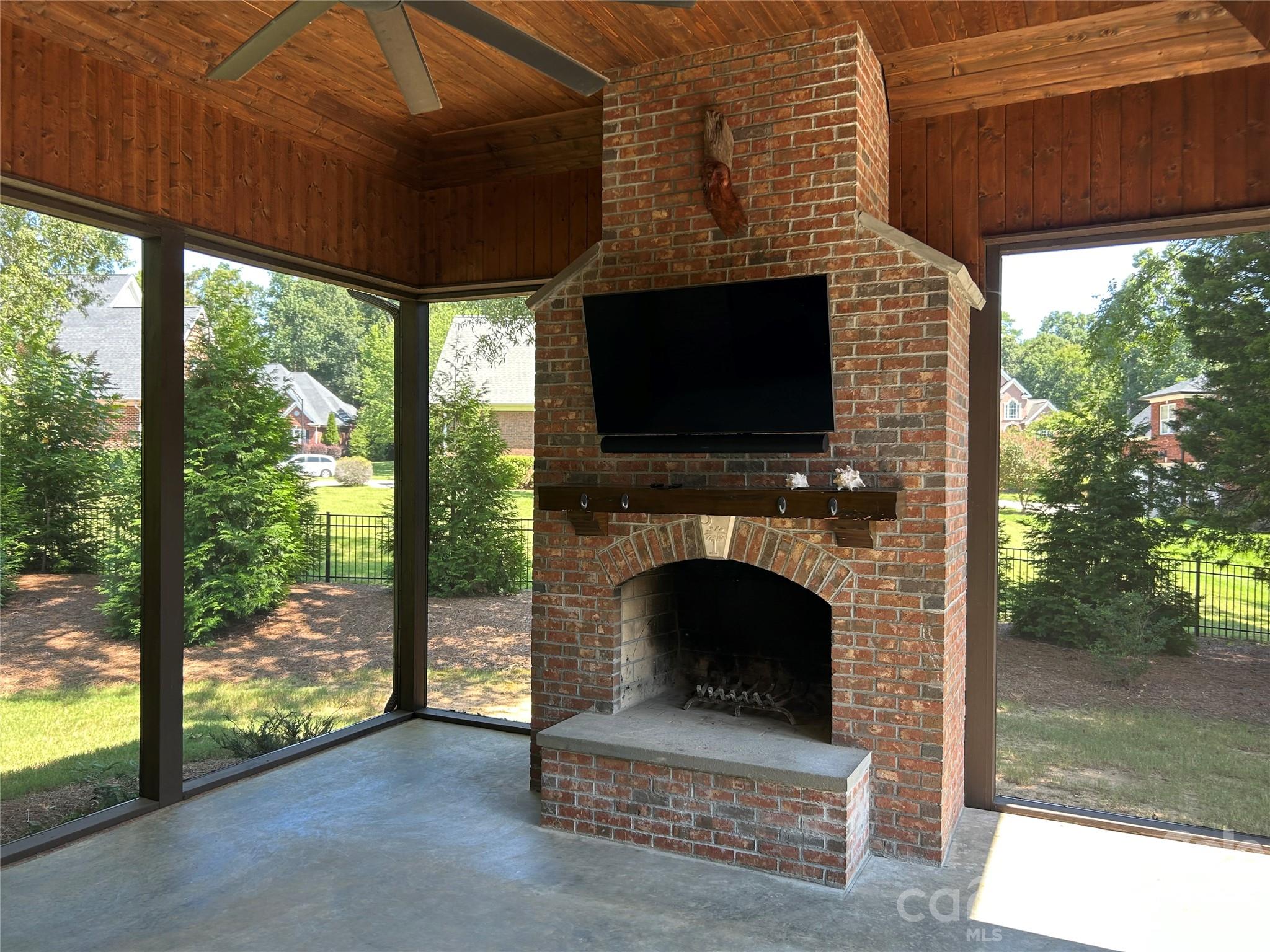Covered Porch with outdoor Fireplace - 1686 Nestledown Court, Rock Hill