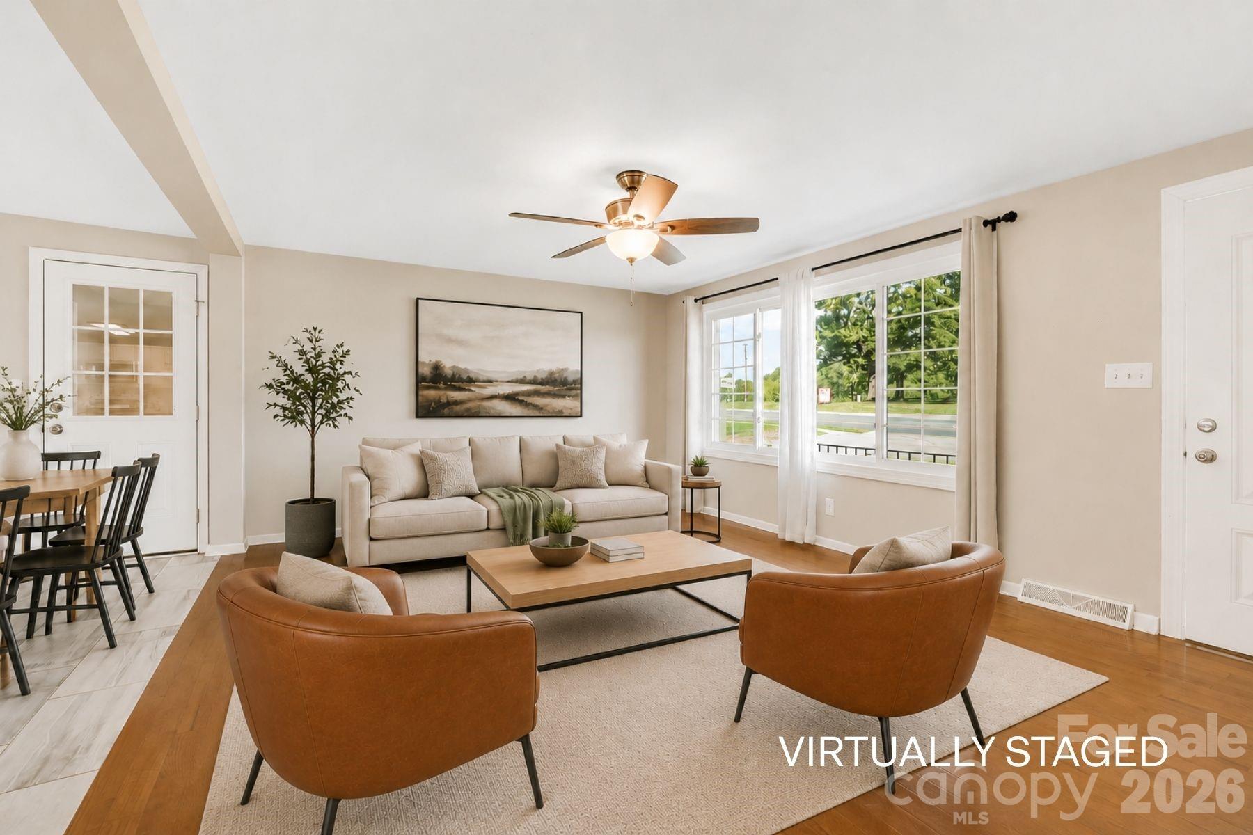 Picture window in living room allows for tons of natural light! - 409 Oak Street Extension, Forest City