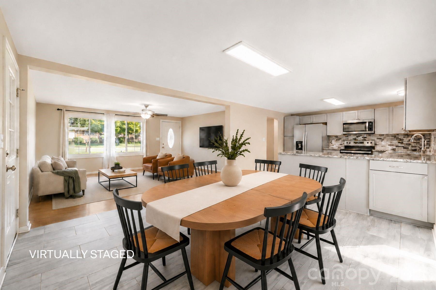 Virtually staged dining area. - 409 Oak Street Extension, Forest City