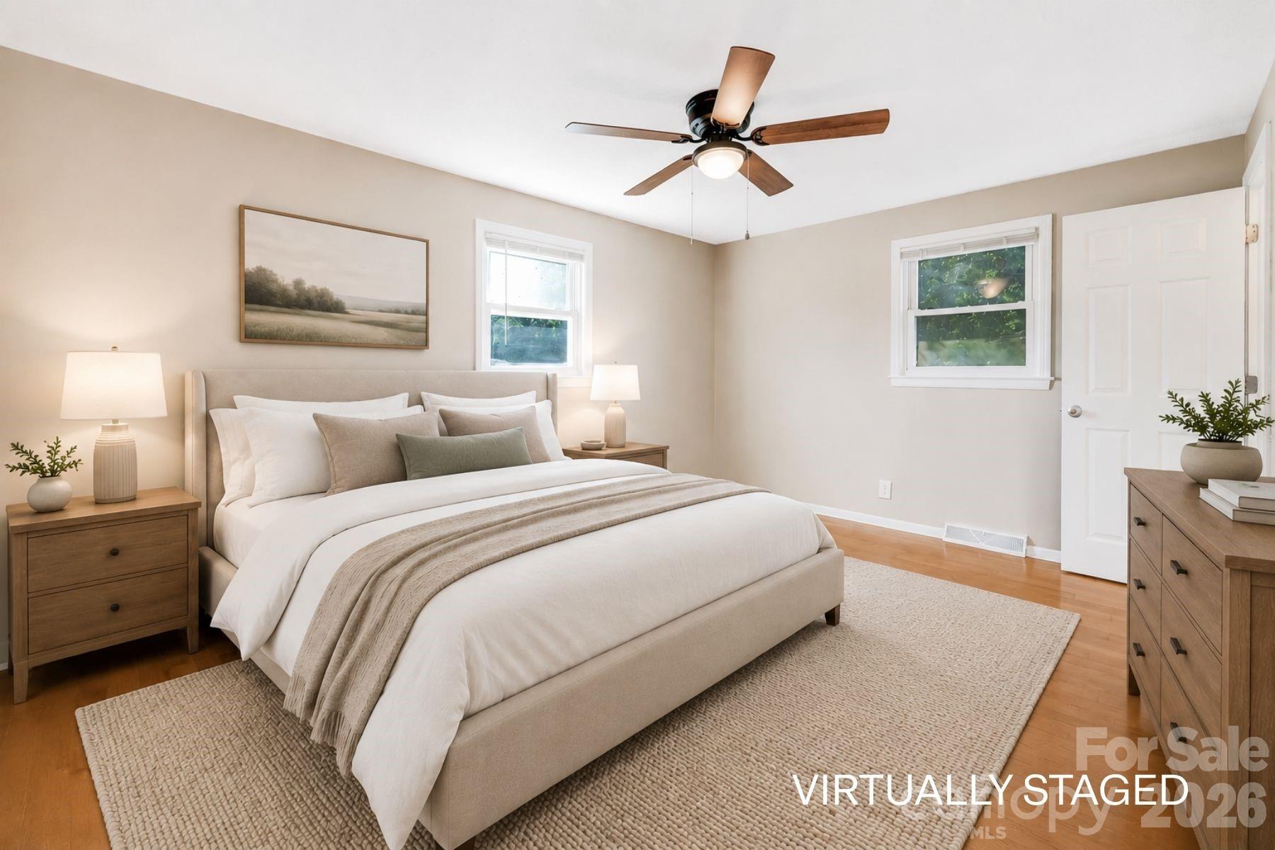 Primary bedroom has walk in closet and on suite bathroom. - 409 Oak Street Extension, Forest City